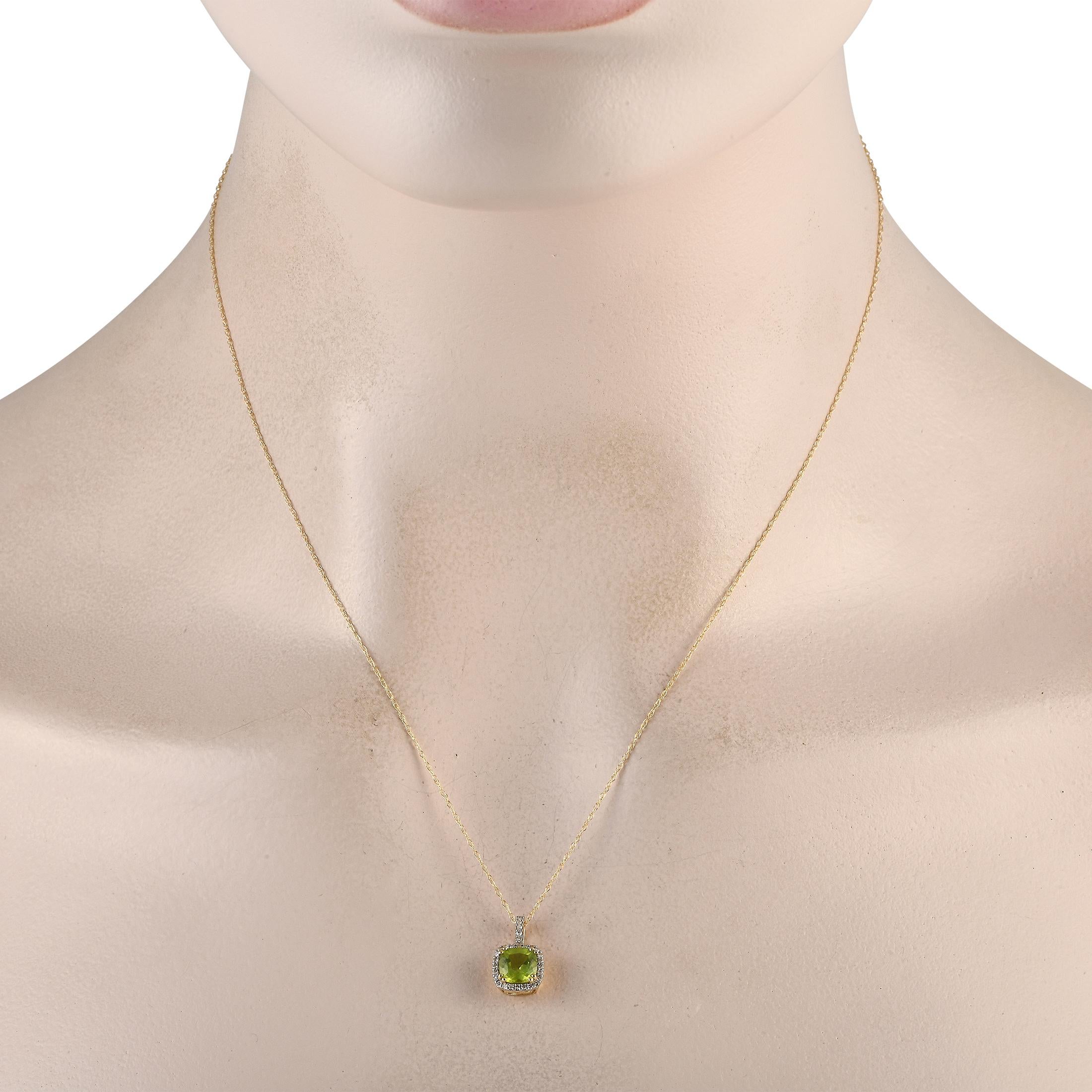 This luxurious necklace will never go out of style. Suspended from a delicate 18 chain, youll find an opulent 14K Yellow Gold pendant measuring 0.50 long by 0.25 wide. At the center, a stunning Peridot gemstone comes to life thanks to sparkling
