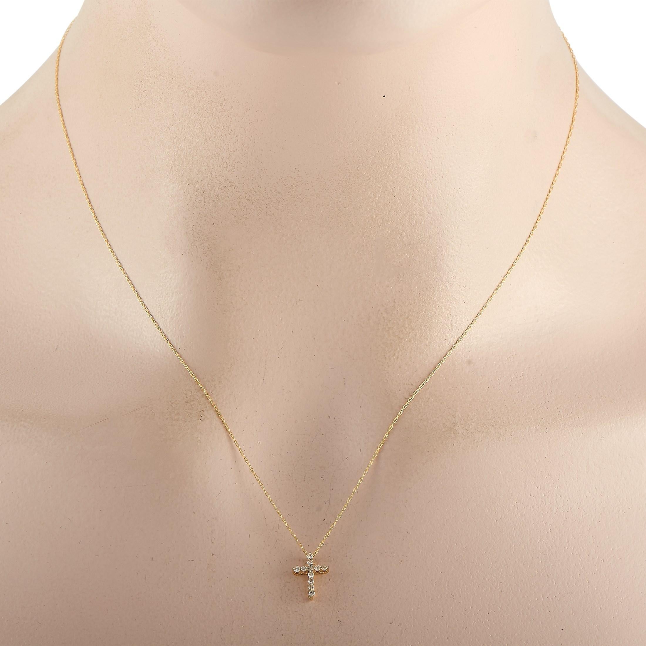 This LB Exclusive 14K Yellow Gold 0.10 ct Diamond Cross Pendant Necklace features a delicate 14K Yellow Gold chain measuring 18 inches in length. The necklace features a matching 14K yellow gold pendant set with 0.10 carats of round-cut diamonds.