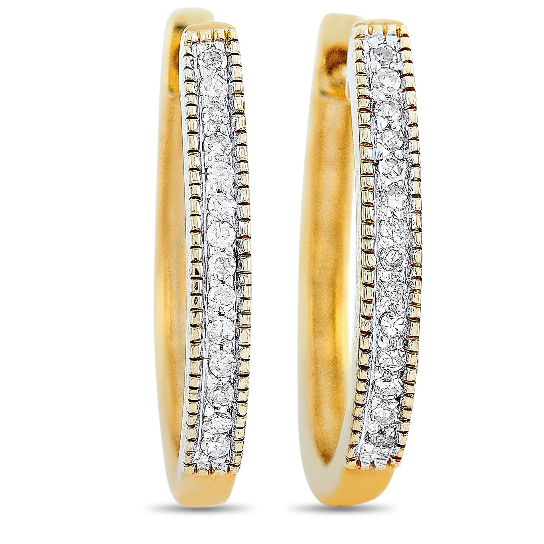 These LB Exclusive earrings are made of 14K yellow gold and each of the two weighs 1.15 grams. They measure 0.60” in length and 0.08” in width. The pair is embellished with diamonds that total 0.10 carats.
 
 The earrings are offered in brand new