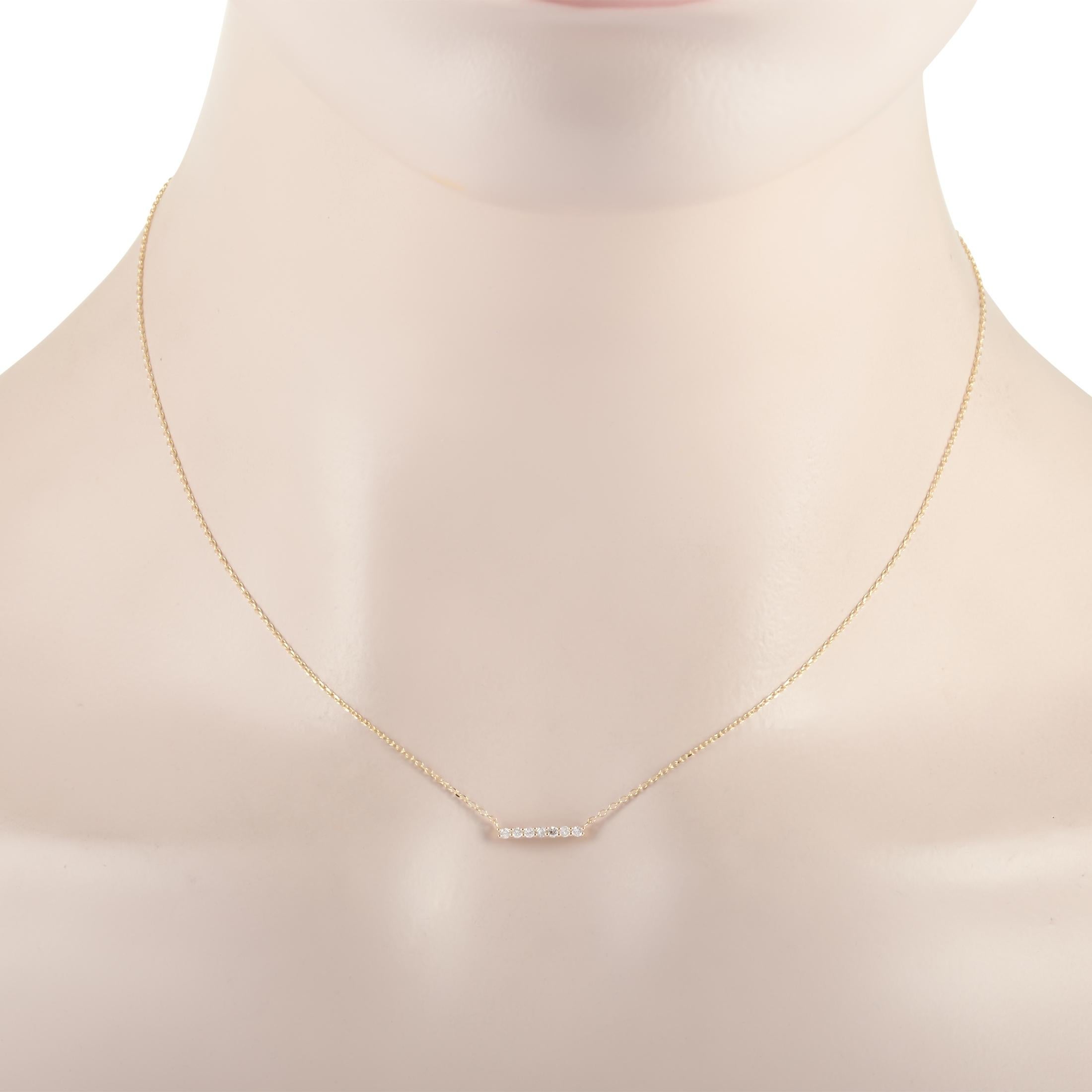 This LB Exclusive necklace is made of 14K yellow gold and embellished with diamonds that amount to 0.10 carats. The necklace weighs 1.3 grams and boasts a 15” chain and a pendant that measures 0.07” in length and 0.44” in width.

Offered in brand