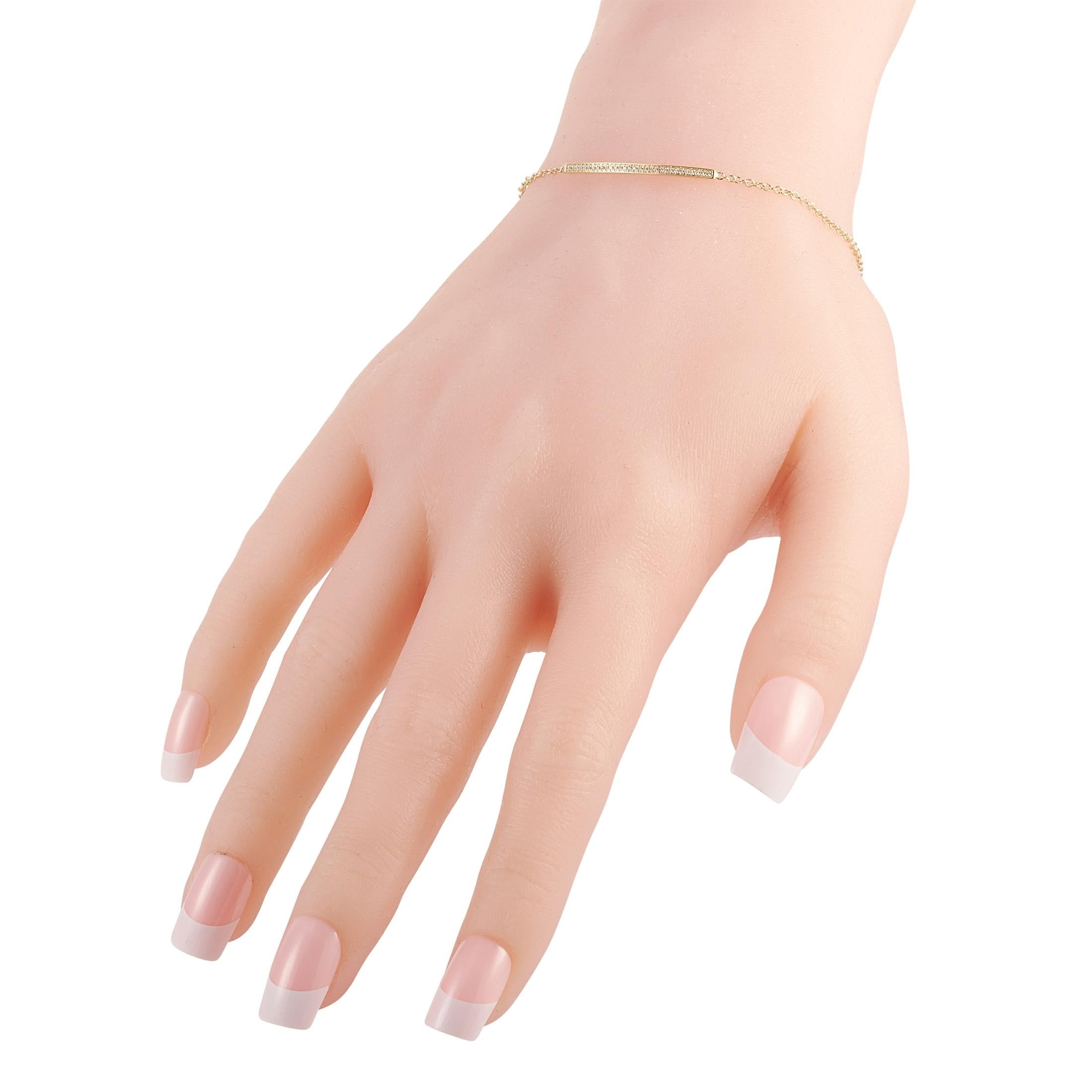 This LB Exclusive bracelet is crafted from 14K yellow gold and weighs 1.9 grams, measuring 6.50” in length. The bracelet is set with diamonds that total 0.10 carats.
 
 Offered in brand new condition, this item includes a gift box.
