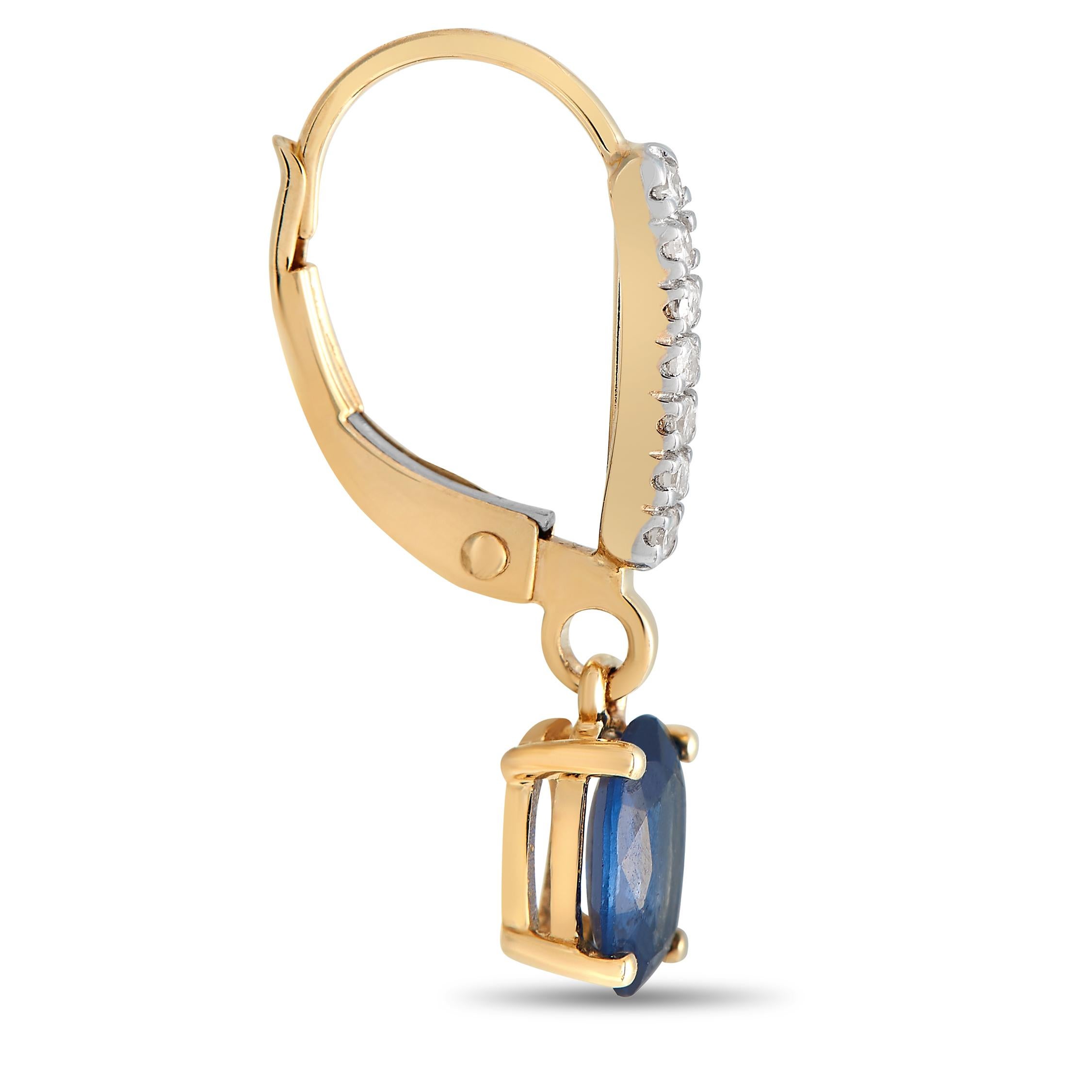 Stunning oval-shaped Sapphire gemstones are elevated by sparkling Diamond accents totaling 0.10 carats on these impressive luxury earrings. Simple, elegant, and understated, each one features a 14K Yellow Gold setting measuring 0.75 long by 0.15