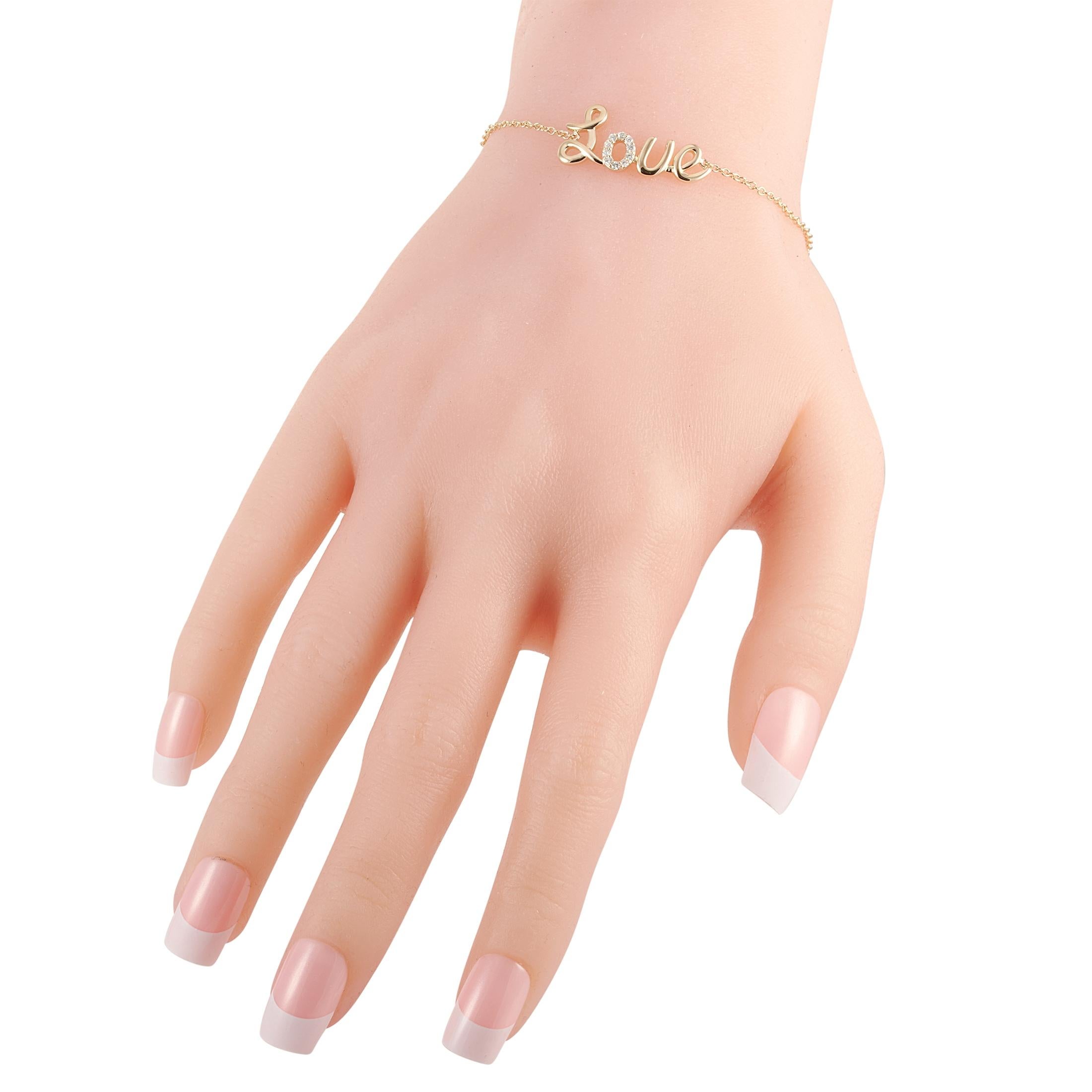 This LB Exclusive love bracelet is crafted from 14K yellow gold and weighs 2.9 grams, measuring 6.50” in length. The bracelet is set with diamonds that total 0.10 carats.
 
 Offered in brand new condition, this item includes a gift box.
