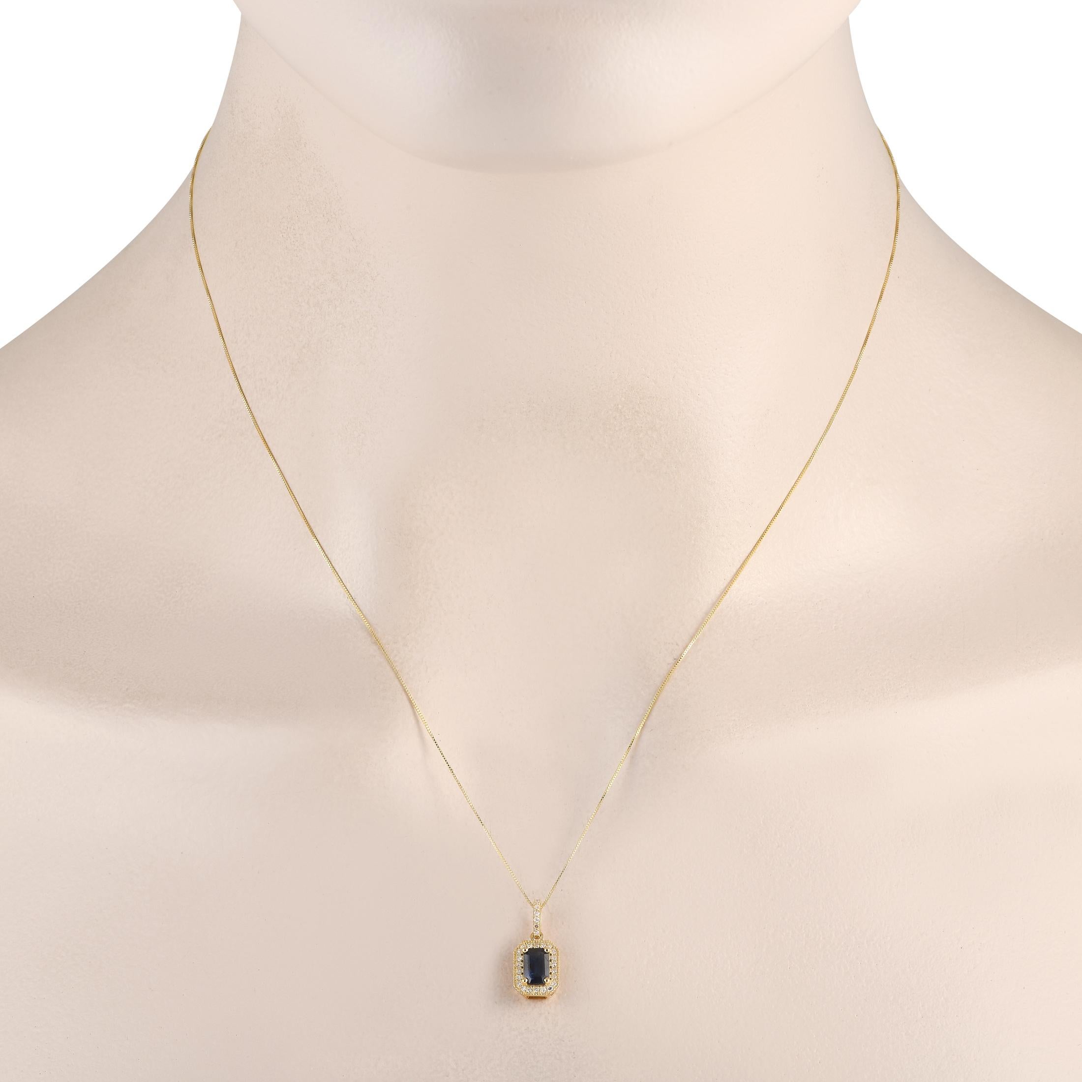 This timeless necklace will add a pop of color to any ensemble. Suspended from an 18 chain, an opulent 14K Yellow Gold pendant measures 0.65 long by 0.25 wide. Its elevated by a captivating Sapphire center stone and Diamond accents totaling 0.10
