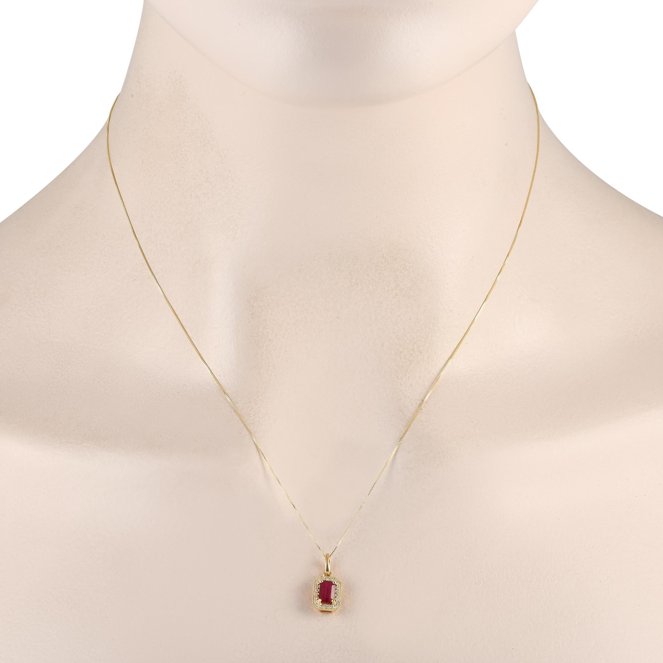 This simple, elegant necklace is nothing short of breathtaking. On the opulent 14K yellow gold pendant  which measures 0.65 long by 0.25 wide  youll find a radiant ruby center stone surrounded by diamond accents with a total weight of 0.10 carats.