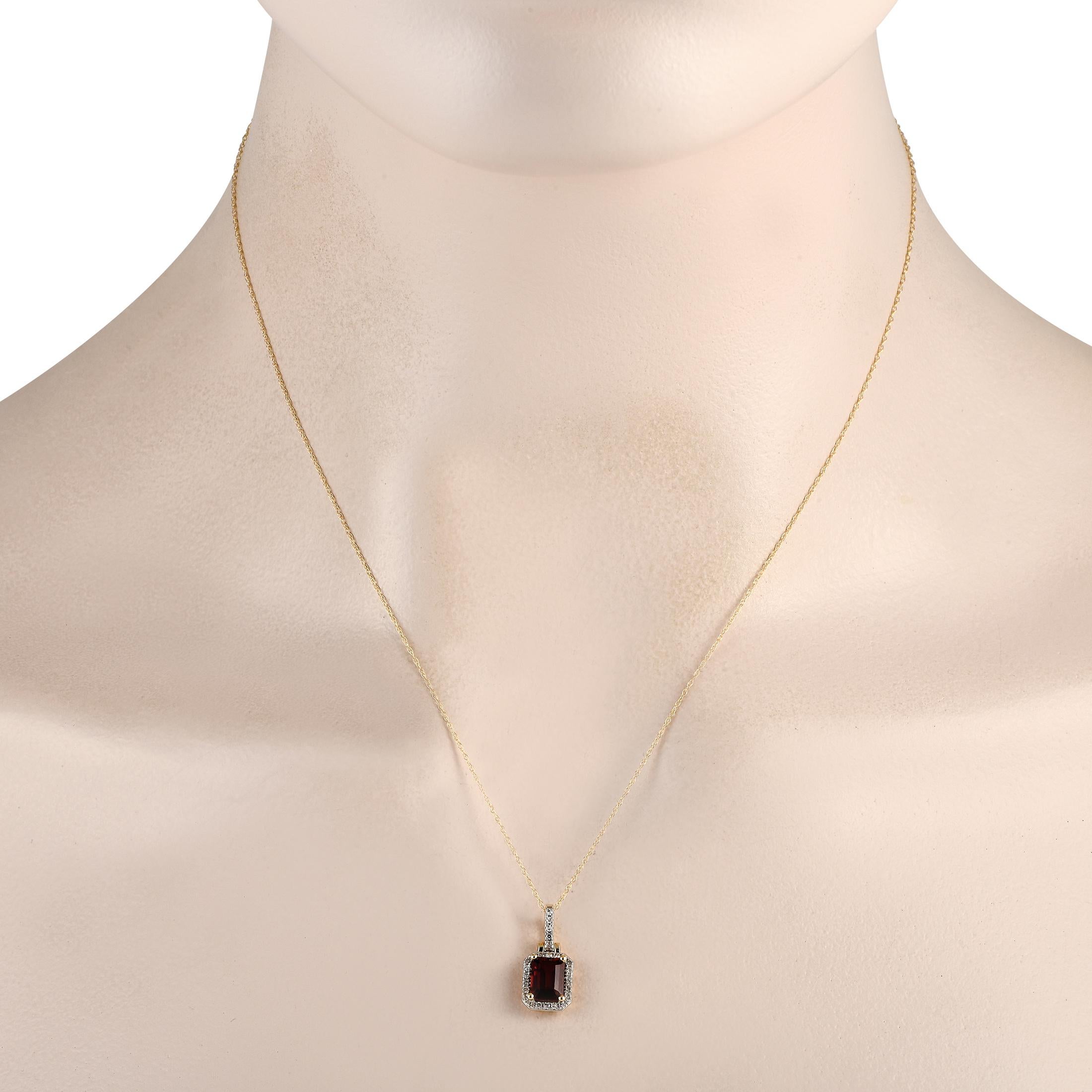 This luxury necklace is truly timeless in design. Crafted from 14K Yellow Gold, it features a pendant measuring 0.65 long by 0.30 wide suspended from an 18 chain. It includes a striking Garnet center stone and Diamond accents totaling 0.12