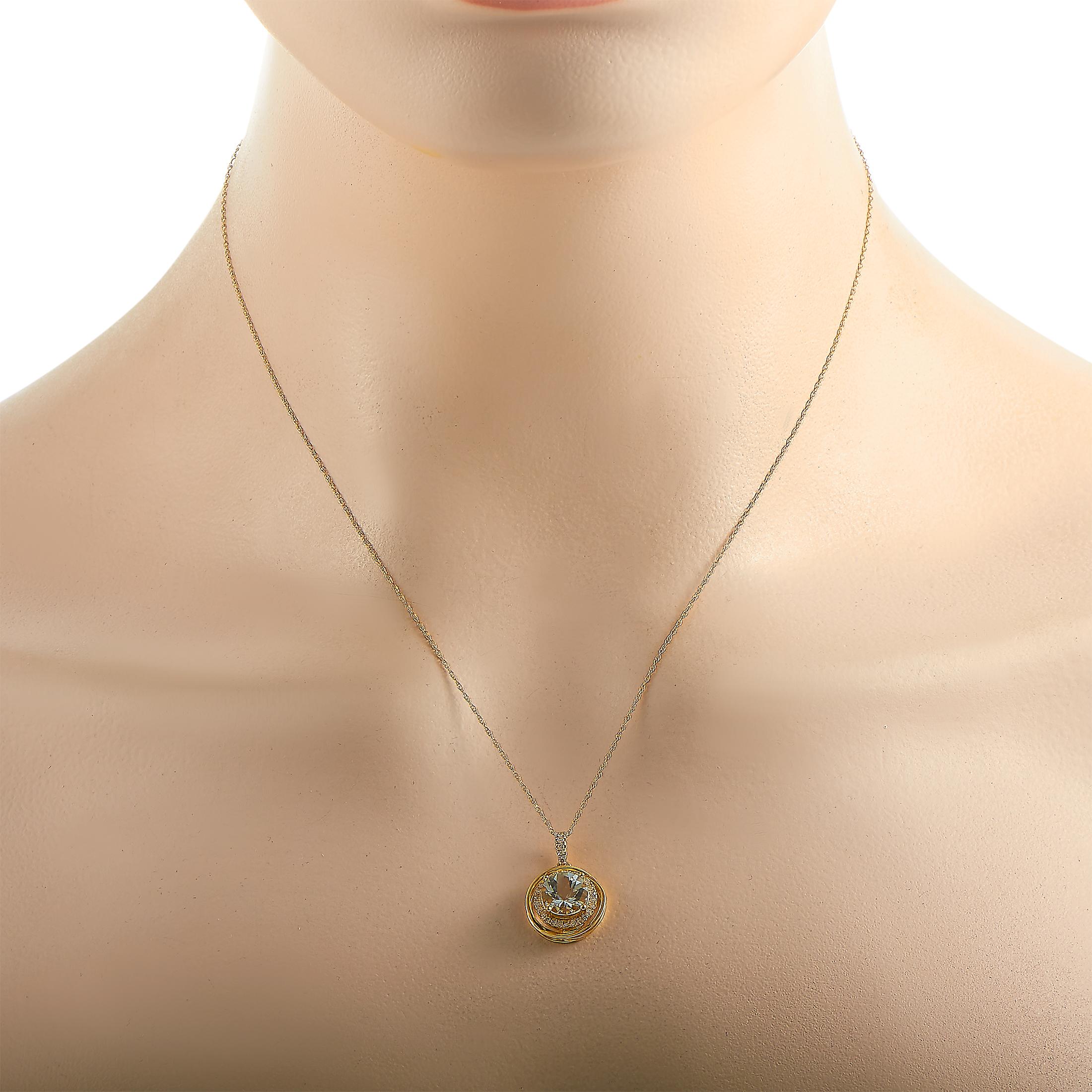 This LB Exclusive necklace is crafted from 14K yellow gold and weighs 2.7 grams. It is presented with an 18” chain and a pendant that measures 0.75” in length and 0.60” in width. The necklace is embellished with a topaz and a total of 0.13 carats of
