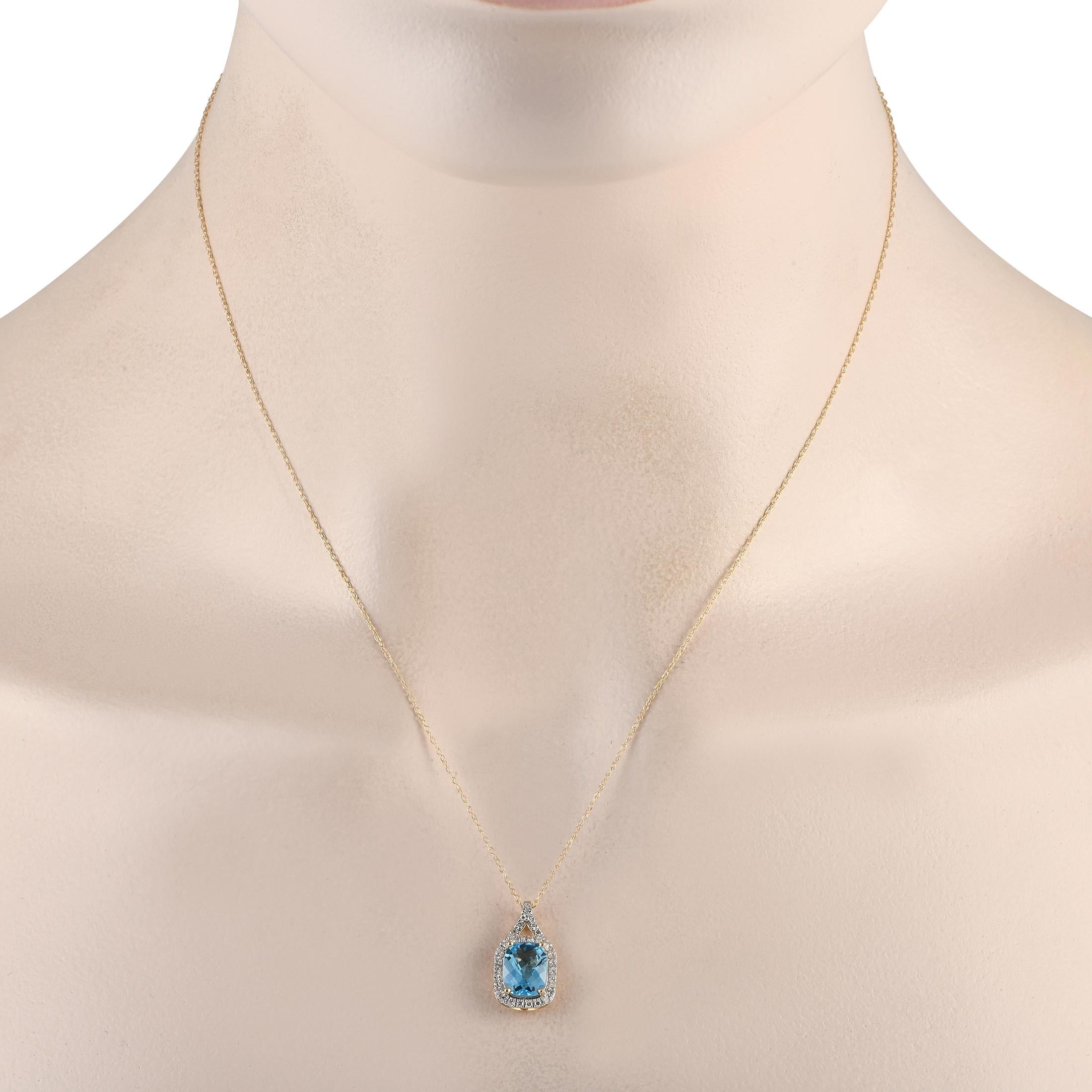 Marked with an exquisite sky blue gemstone, this diamond and blue topaz necklace is something you'll find yourself reaching for on special days. The necklace features a splitting bail that continues to a rectangular halo with rounded corners. Right