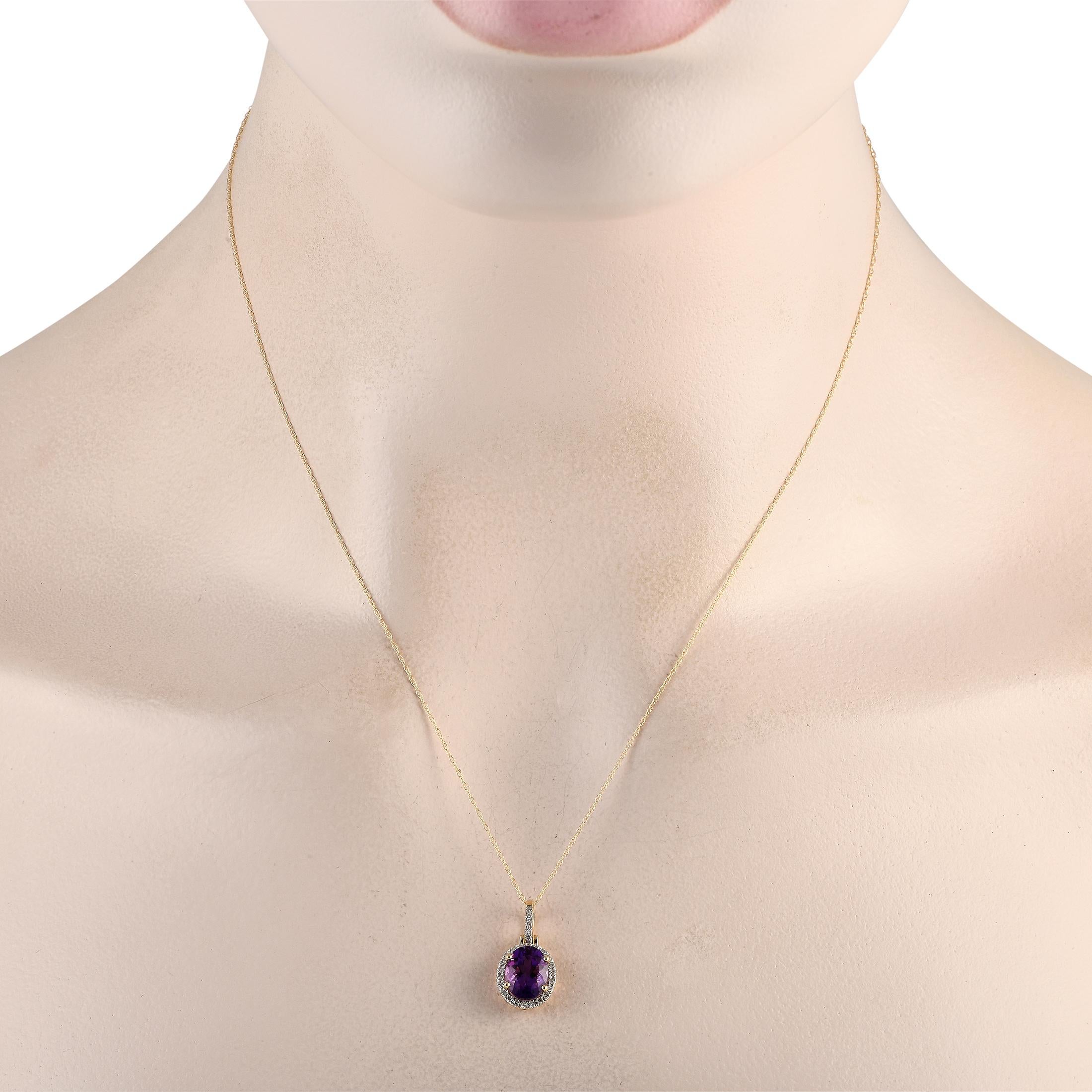 Add elegance to any ensemble with this impeccably crafted necklace. Crafted from 14K yellow gold, this piece features a stunning amethyst center stone and diamond accents with a total weight of 0.13 carats. The pendant measures 0.75 long by 0.45