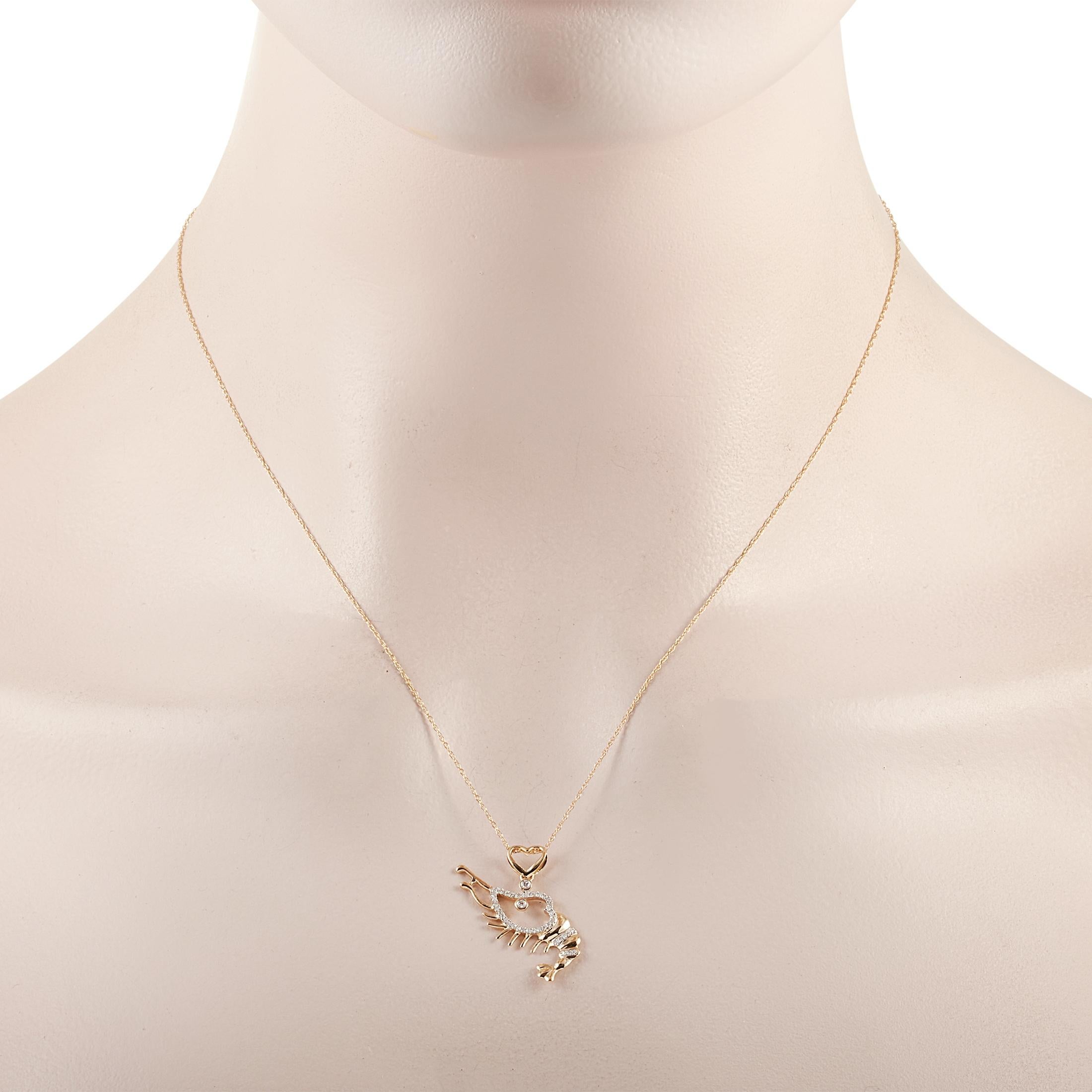 This LB Exclusive necklace is made of 14K yellow gold and embellished with diamonds that amount to 0.14 carats. The necklace weighs 1.9 grams and boasts a 16” chain and a pendant that measures 1” in length and 0.50” in width.
 
 Offered in brand new