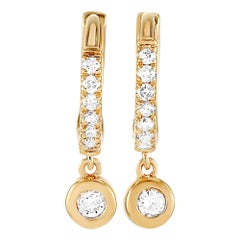 Boucles d'oreilles exclusives en or jaune 14 carats avec diamants 0,15 carat