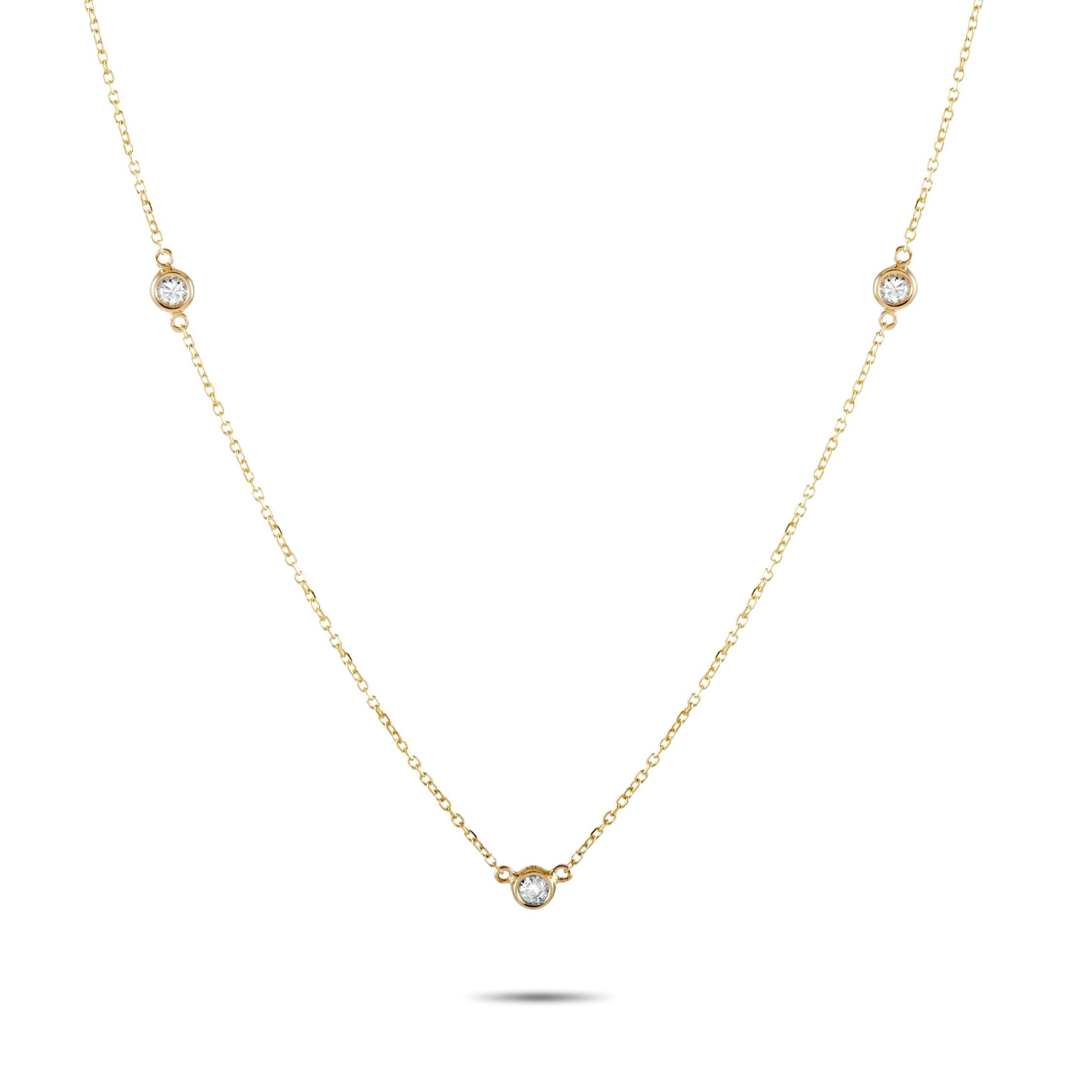 This LB Exclusive necklace is crafted from 14K yellow gold and weighs 1.3 grams, measuring 16” in length. The necklace is set with diamonds that total 0.15 carats.

Offered in brand new condition, this jewelry piece includes a gift box.