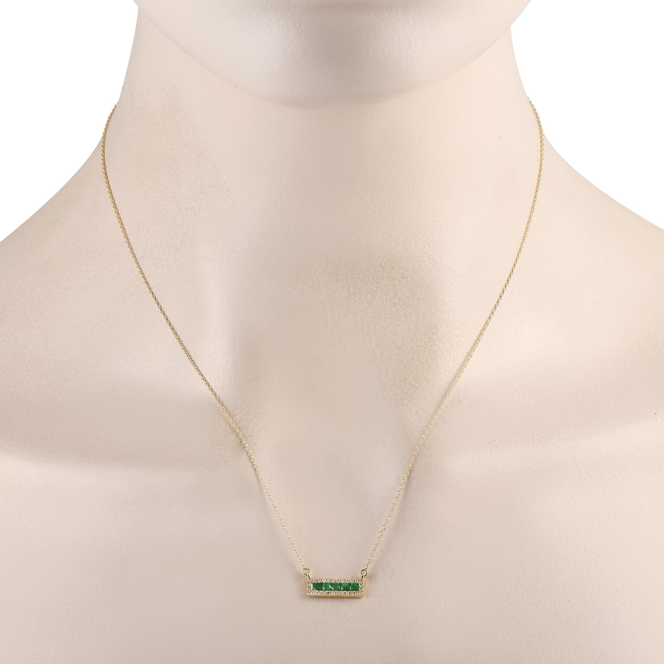 Add a touch of luxury to any ensemble with this impeccably crafted necklace. Suspended at the center of an 18 chain, youll find a 14K Yellow Gold pendant measuring 0.15 long by 0.65 wide. A series of Emeralds elevate the center, while sparkling