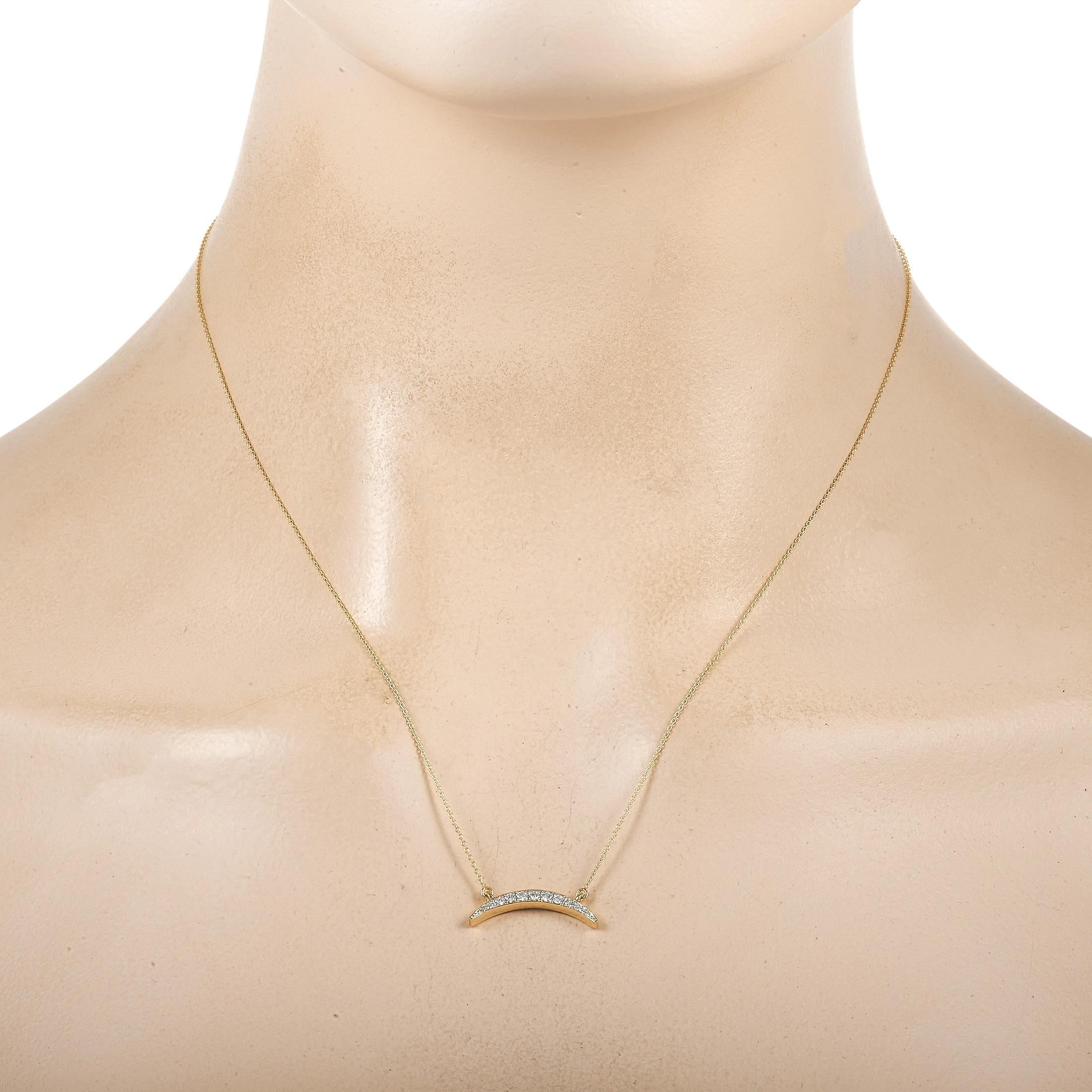 This pretty LB Exclusive necklace is sure to wow. The necklace is made with a yellow gold chain, highlighting a beautiful 14K yellow gold half-moon pendant. The face of the pendant is set with a row of round-cut diamonds, totaling 0.16 carats. The