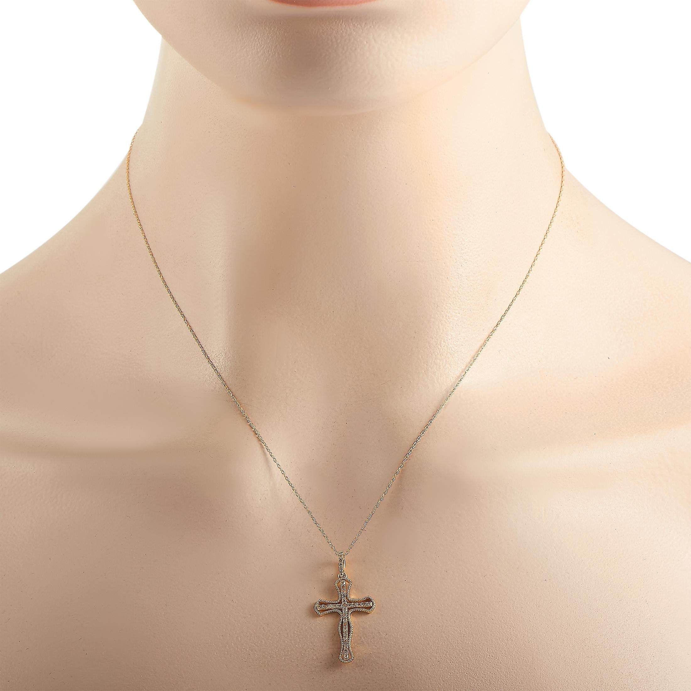 This LB Exclusive necklace is made of 14K yellow gold and weighs 1.7 grams. It is presented with an 18” chain and a cross pendant that measures 1.25” in length and 0.65” in width. The necklace is embellished with diamonds that amount to 0.20