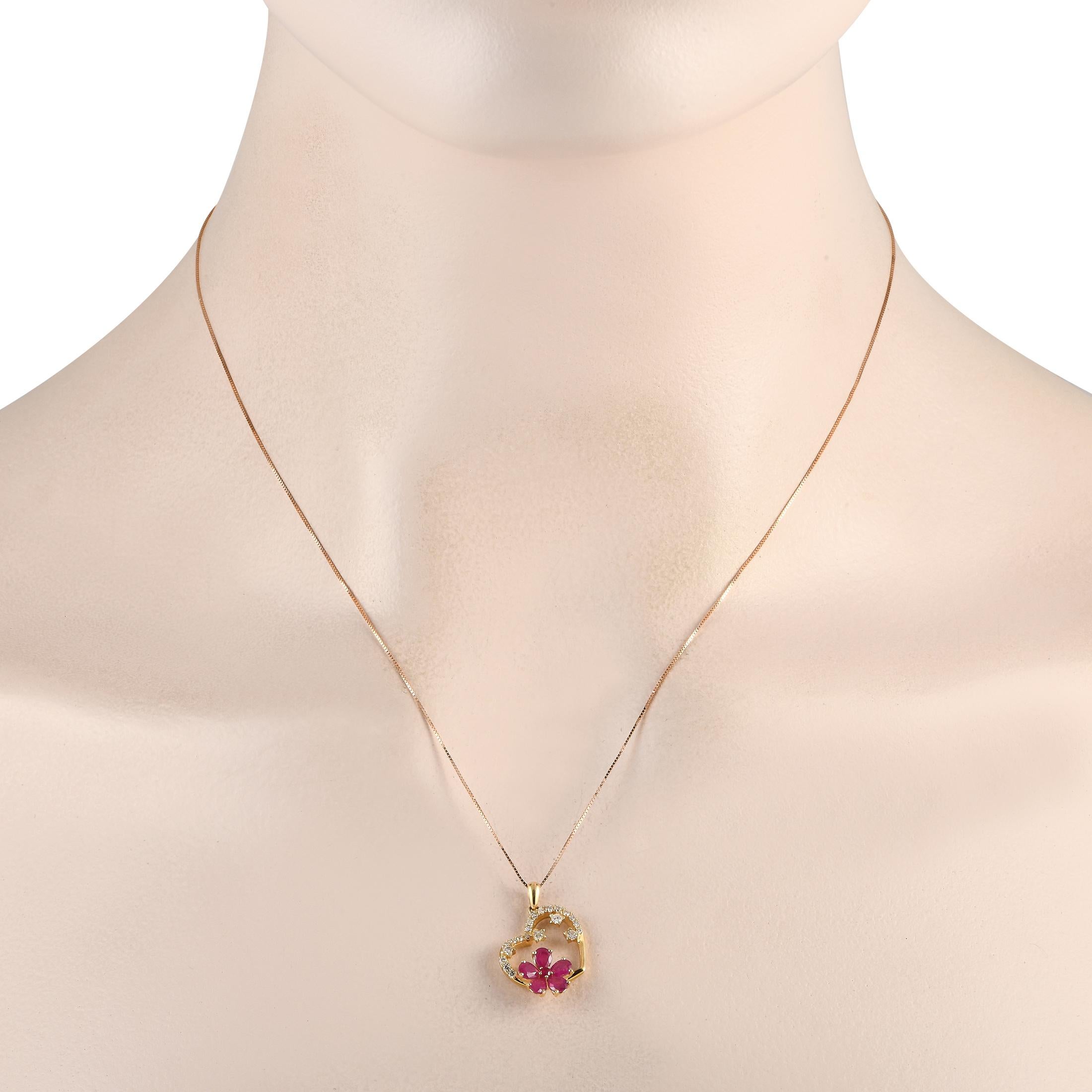 It doesnt get any more charming than this exquisite necklace. This pieces heart-shaped pendant  which measures 0.85 long by 0.65 wide  is elegantly adorned with sparkling Diamonds totaling 0.20 carats and radiant Ruby gemstones in a floral motif.