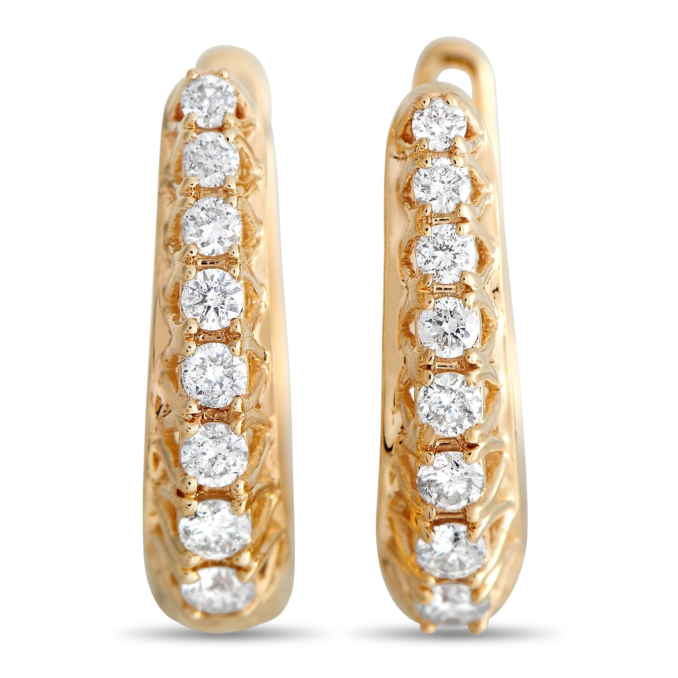 Easy to put on and easy to style with, these yellow-gold huggies cradle your earlobe with elegance. Round diamonds in raised prongs line each snug-fitting hoop. A lever back closure secures the earrings in place. Each earring measures 0.25