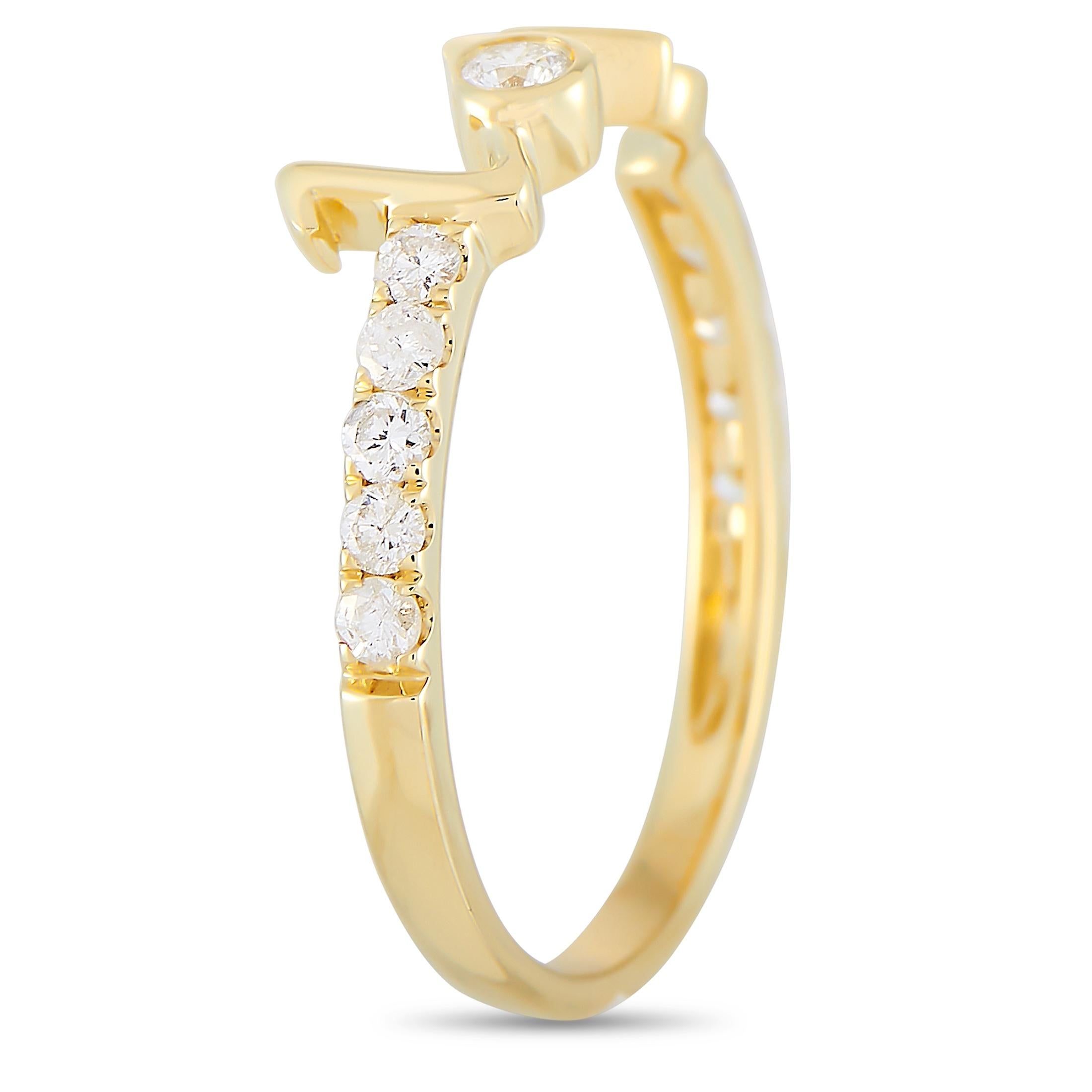 This LB Exclusive love ring is made of 14K yellow gold and embellished with diamonds that amount to 0.25 carats. The ring weighs 1.6 grams and boasts band thickness of 3 mm and top height of 4 mm, while top dimensions measure 5 by 15 mm.
 
 Offered