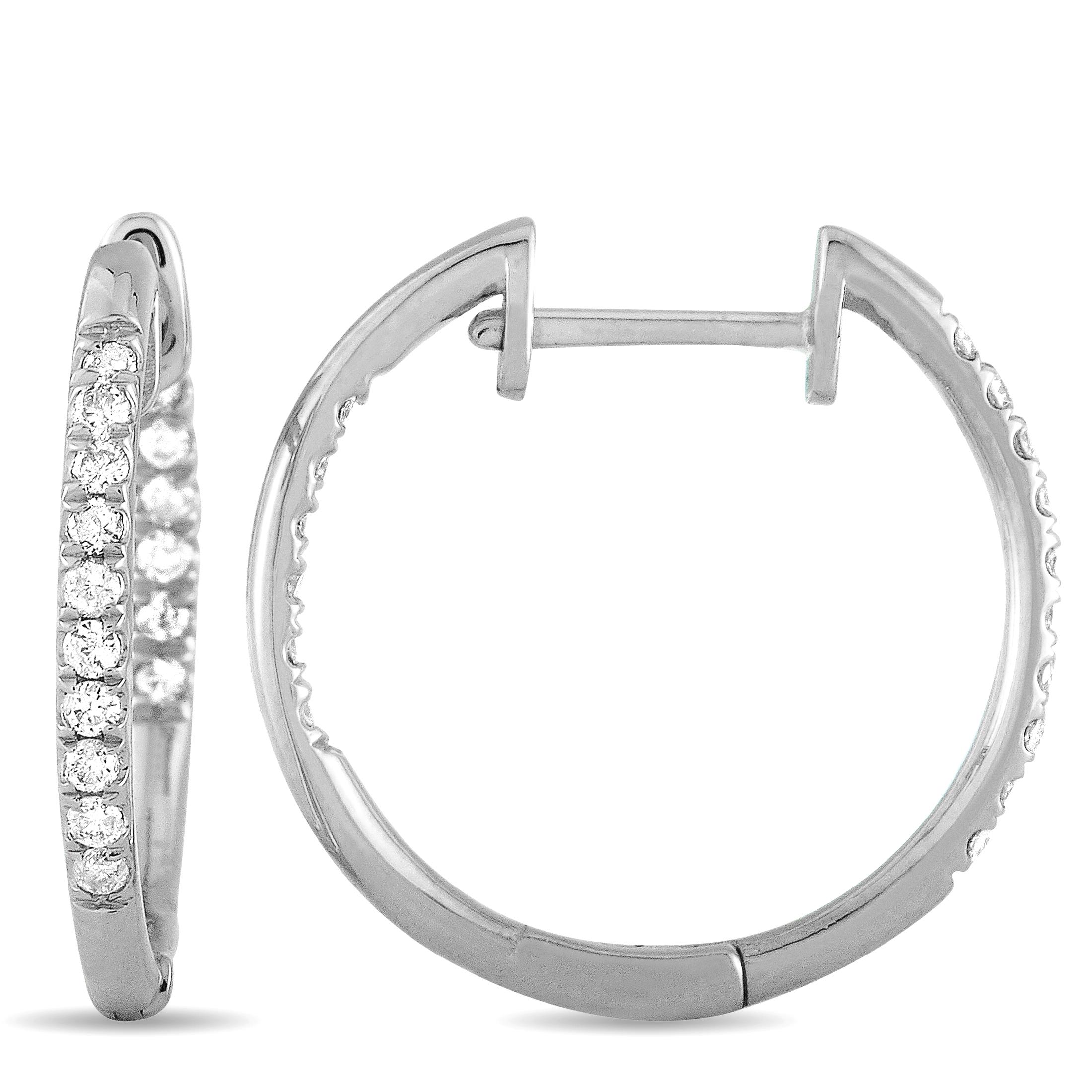 These LB Exclusive hoop earrings are made out of 14K white gold and diamonds that total 0.25 carats. The earrings measure 0.70” in length and 0.65” in width, and each of the two weighs 1.05 grams.
 
 The pair is offered in brand new condition and