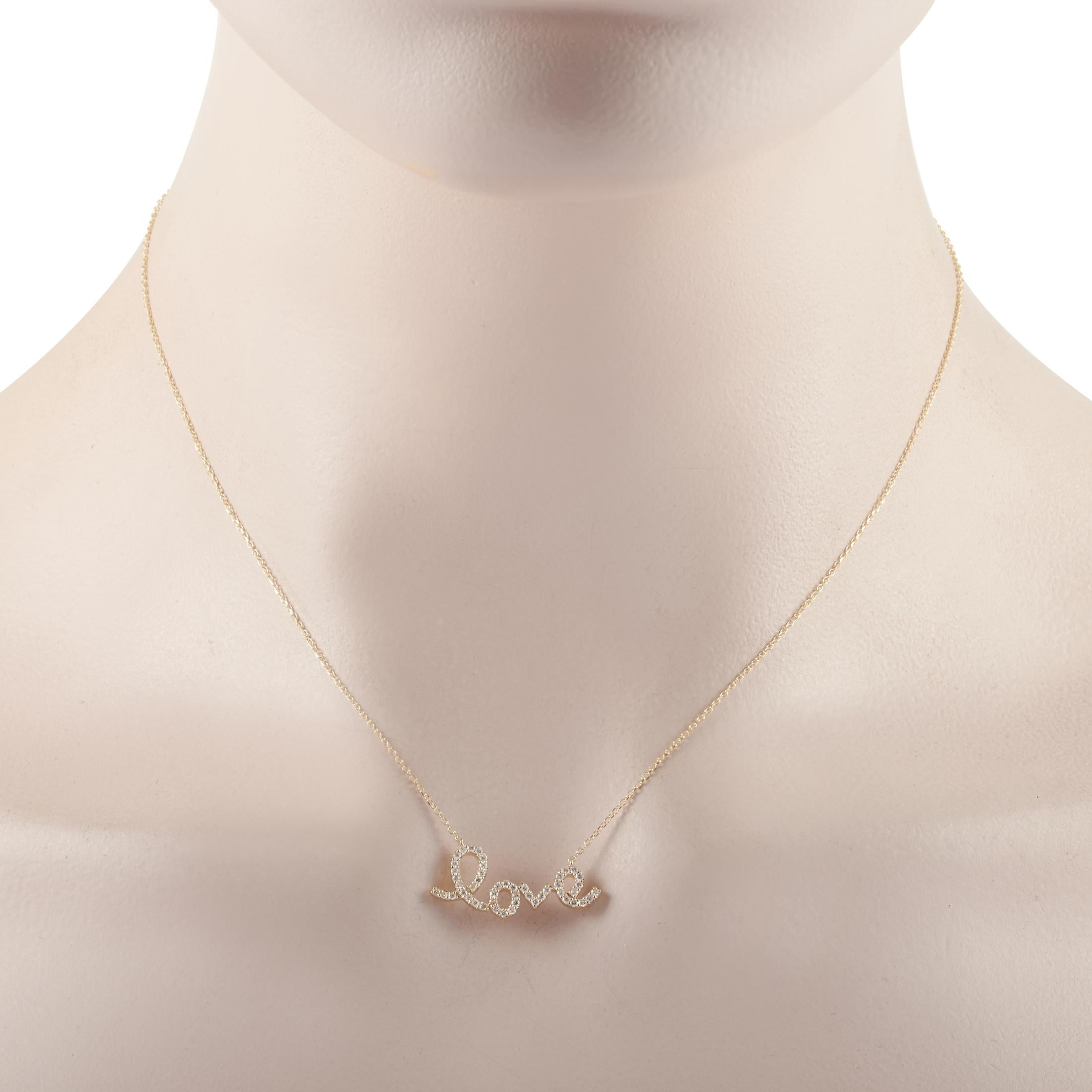 This LB Exclusive necklace is made of 14K yellow gold and embellished with diamonds that amount to 0.26 carats. The necklace weighs 2.5 grams and boasts a 15” chain and a “love” pendant that measures 0.38” in length and 1” in width.

Offered in
