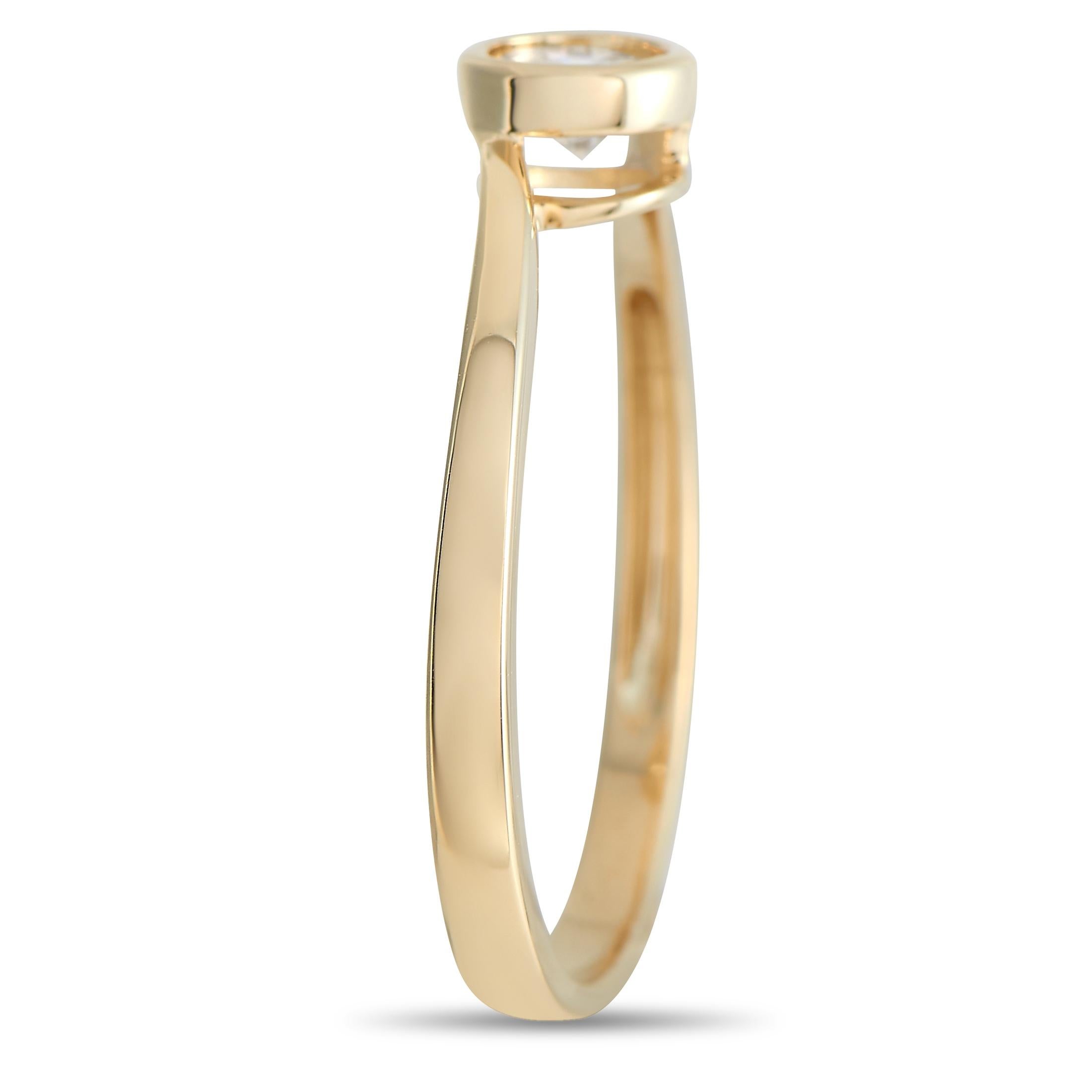 This pretty LB Exclusive 14K Yellow Gold 0.26 ct Diamond Solitaire Ring is a classic. The band is made with 18K Yellow Gold and bezel-set with a 0.26 carat round cut diamond. The ring has a band thickness of 2 mm, a top height of 3 mm, and top