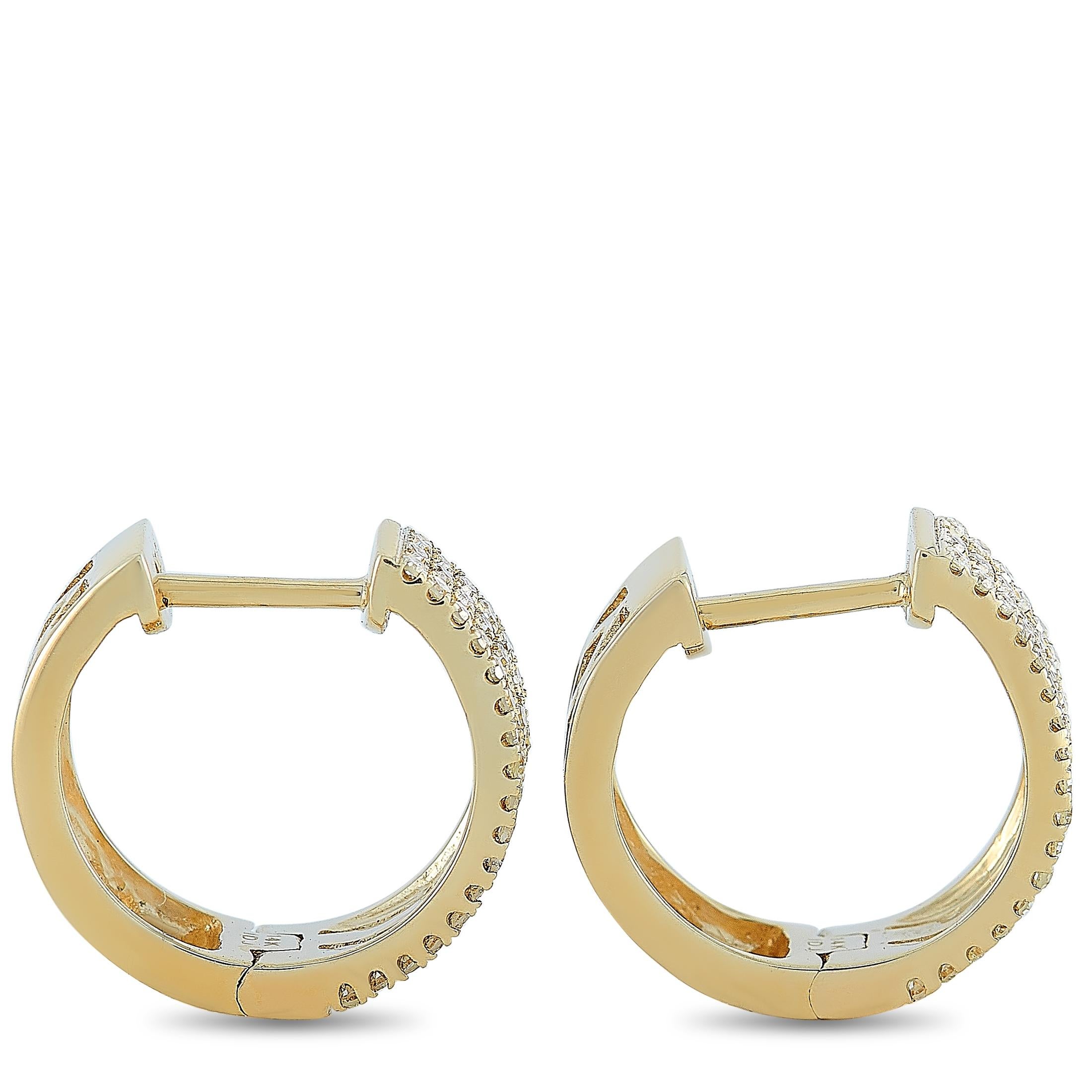 These LB Exclusive hoop earrings are made of 14K yellow gold and each of the two weighs 1.15 grams. They measure 0.50” in length and 0.50” in width. The pair is embellished with diamonds that amount to 0.33 carats.
 
 The earrings are offered in