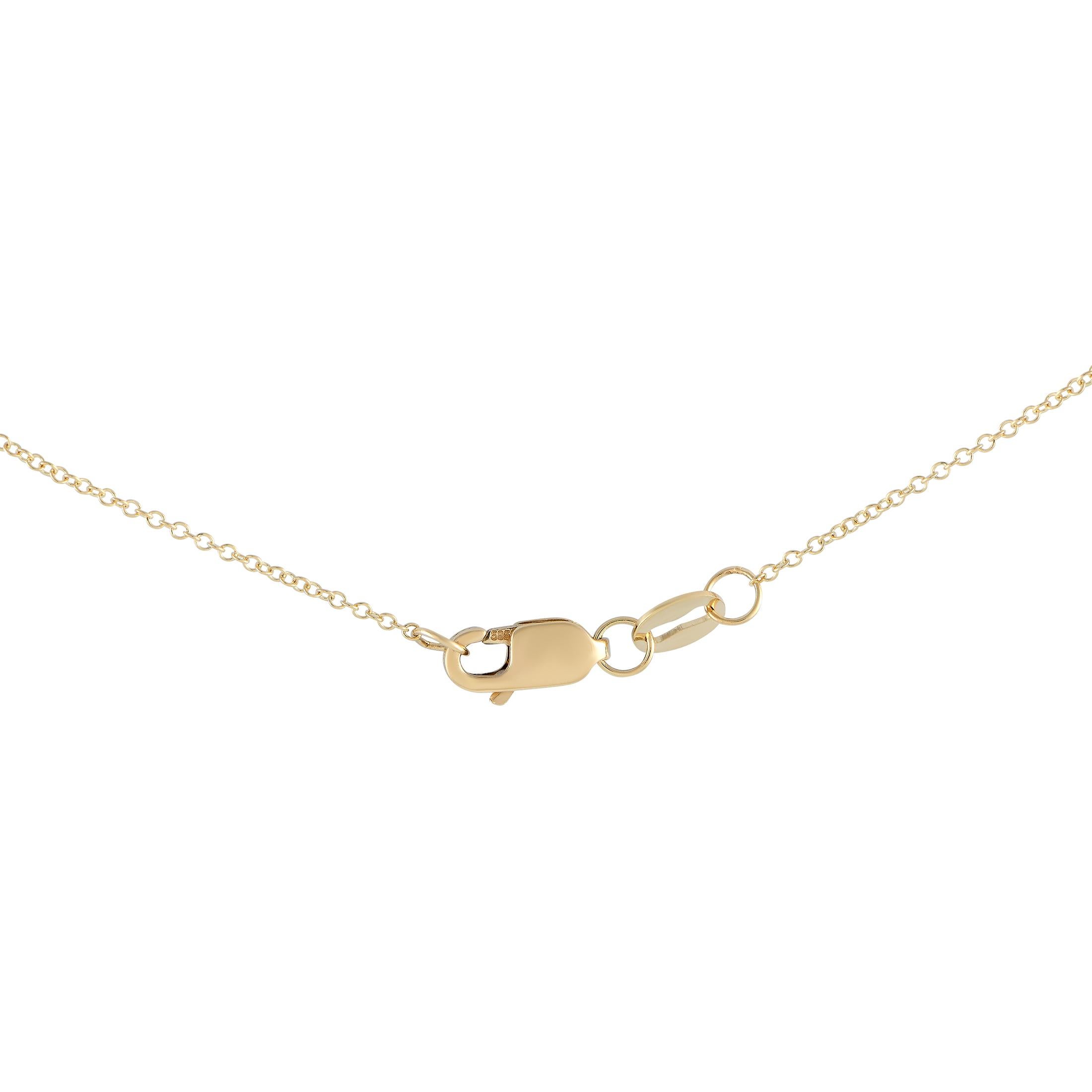 Although beautiful on its own, this station necklace is best worn layered with minimalist necklaces. The chain measures 16 inches long and features seven petite charms stationed at specific points along the chain. Each charm features two baguette
