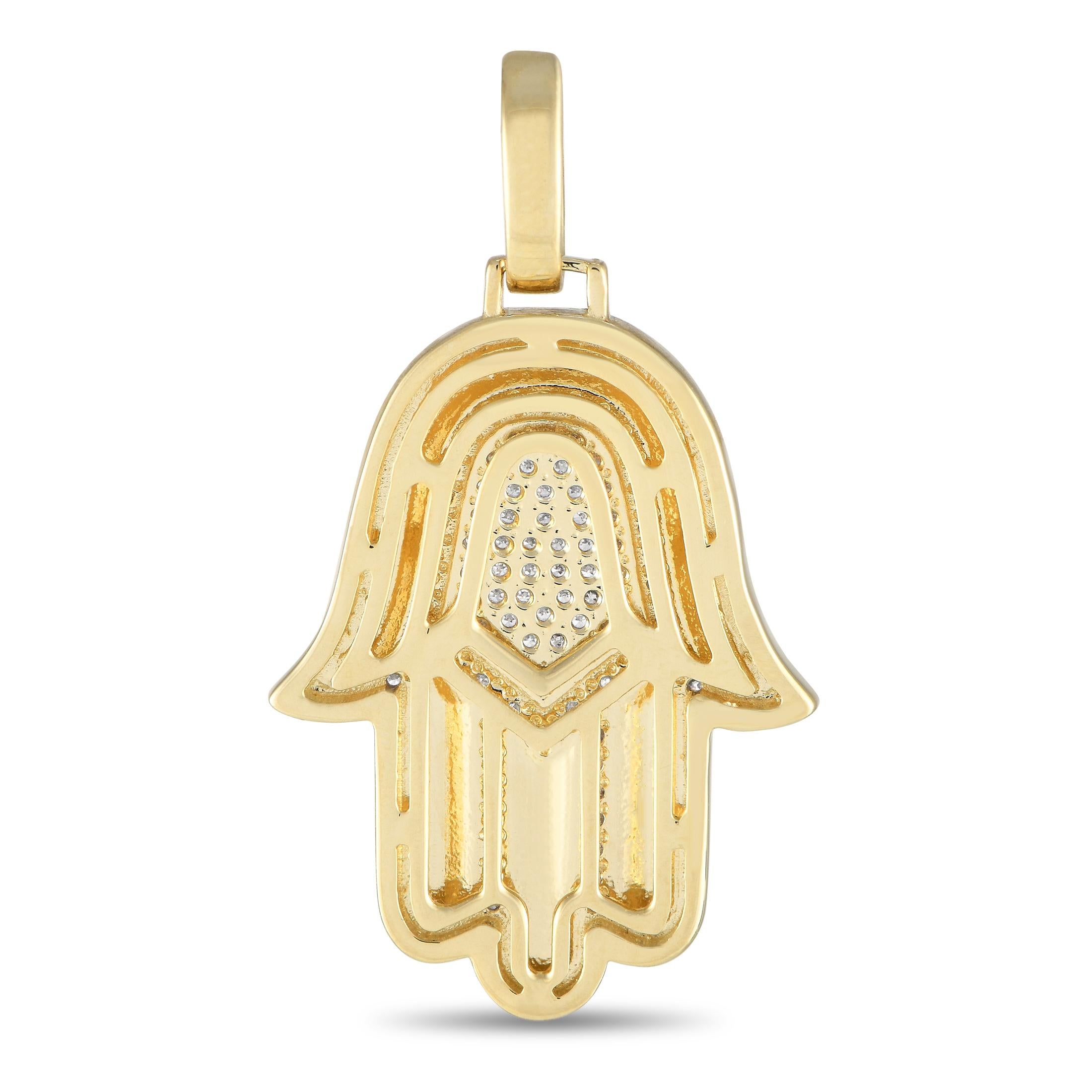The Hamsa is an ancient spiritual symbol meant to ward off unseen evil forces. This luxury Hamsa pendant is crafted from opulent 14K Yellow Gold and shines to life thanks to Diamonds with a total weight of 0.50 carats. It measures 1.45 long by 0.75