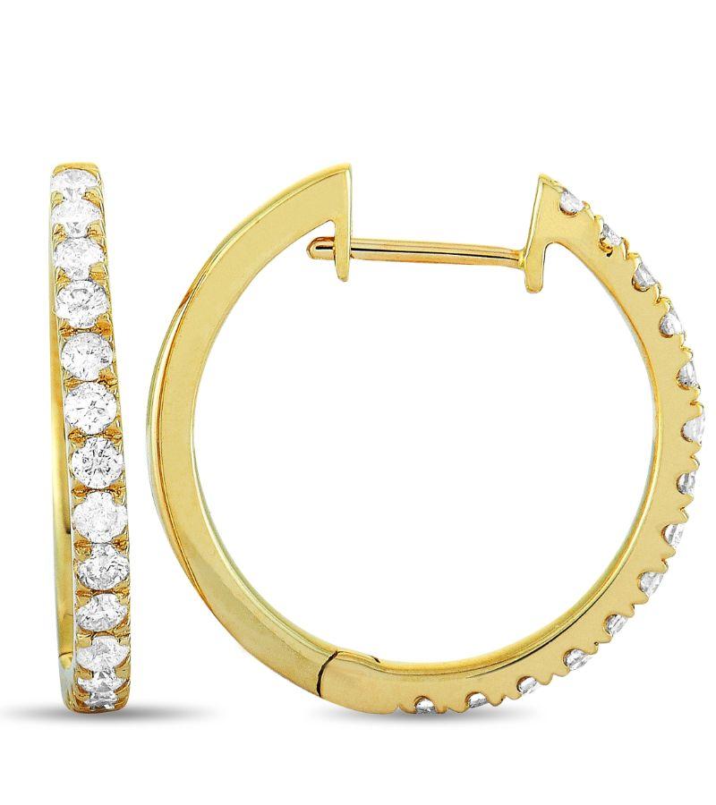 These LB Exclusive hoop earrings are made out of 14K yellow gold and diamonds that total 0.50 carats. The earrings measure 0.75” in length and 0.70” in width, and each of the two weighs 1.5 grams.
 
 The pair is offered in brand new condition and