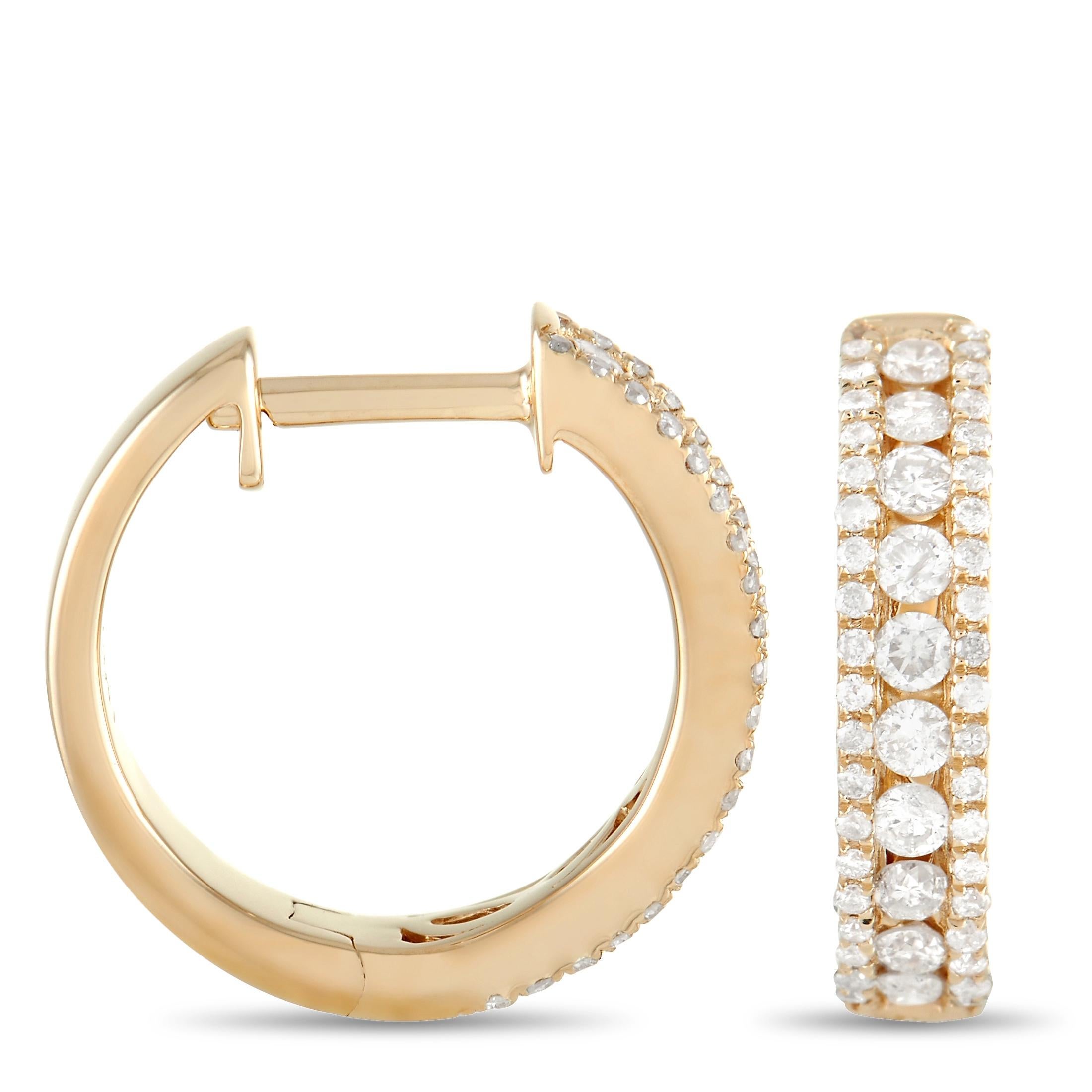 A timeless pairing of 14K yellow gold and shimmering diamonds make these earrings simply exquisite. Each one measures 0.5” round and showcases three rows of diamonds, which together possess a total weight of 0.50 carats. 

This jewelry piece is
