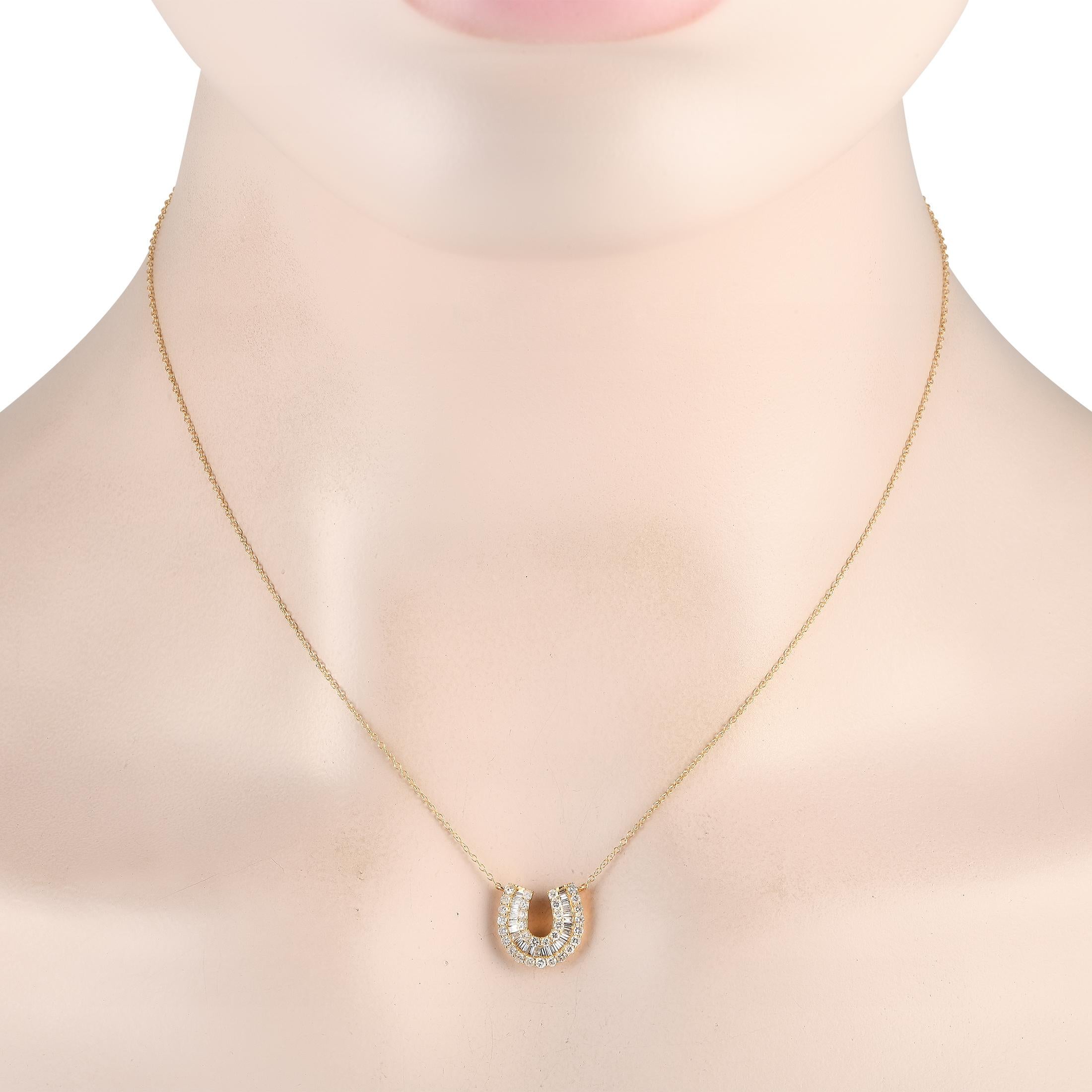 You're lucky to have found this lovely gem! The Horseshoe Necklace is crafted in 14K yellow gold and features a U-shaped row of baguette diamonds set in between U-shaped rows of round diamonds. The 0.45 x 0.50 pendant suspends from a 16 chain with a