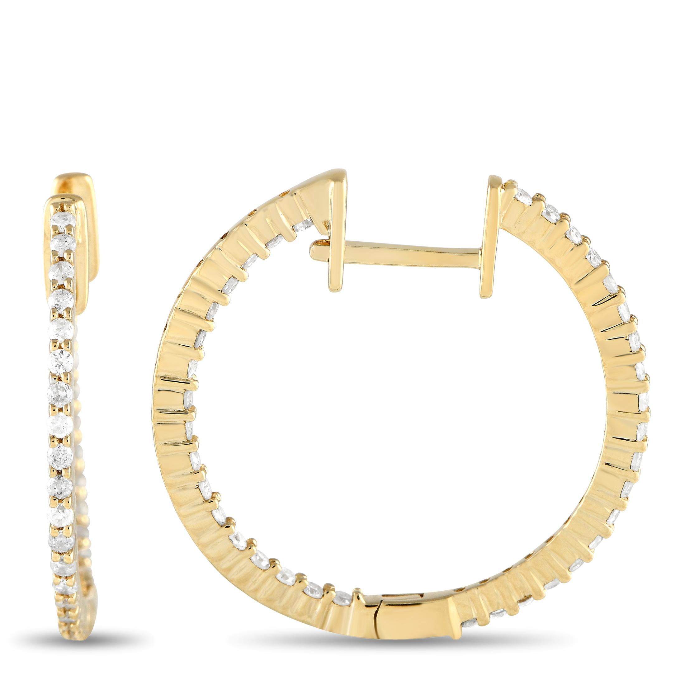 Sleek and delicate in design, these elegant 14K Yellow Gold hoop earrings are a timeless addition to any jewelry collection. The simple setting measures 0.80” round and beautifully showcases the series of sparkling diamonds – together they feature