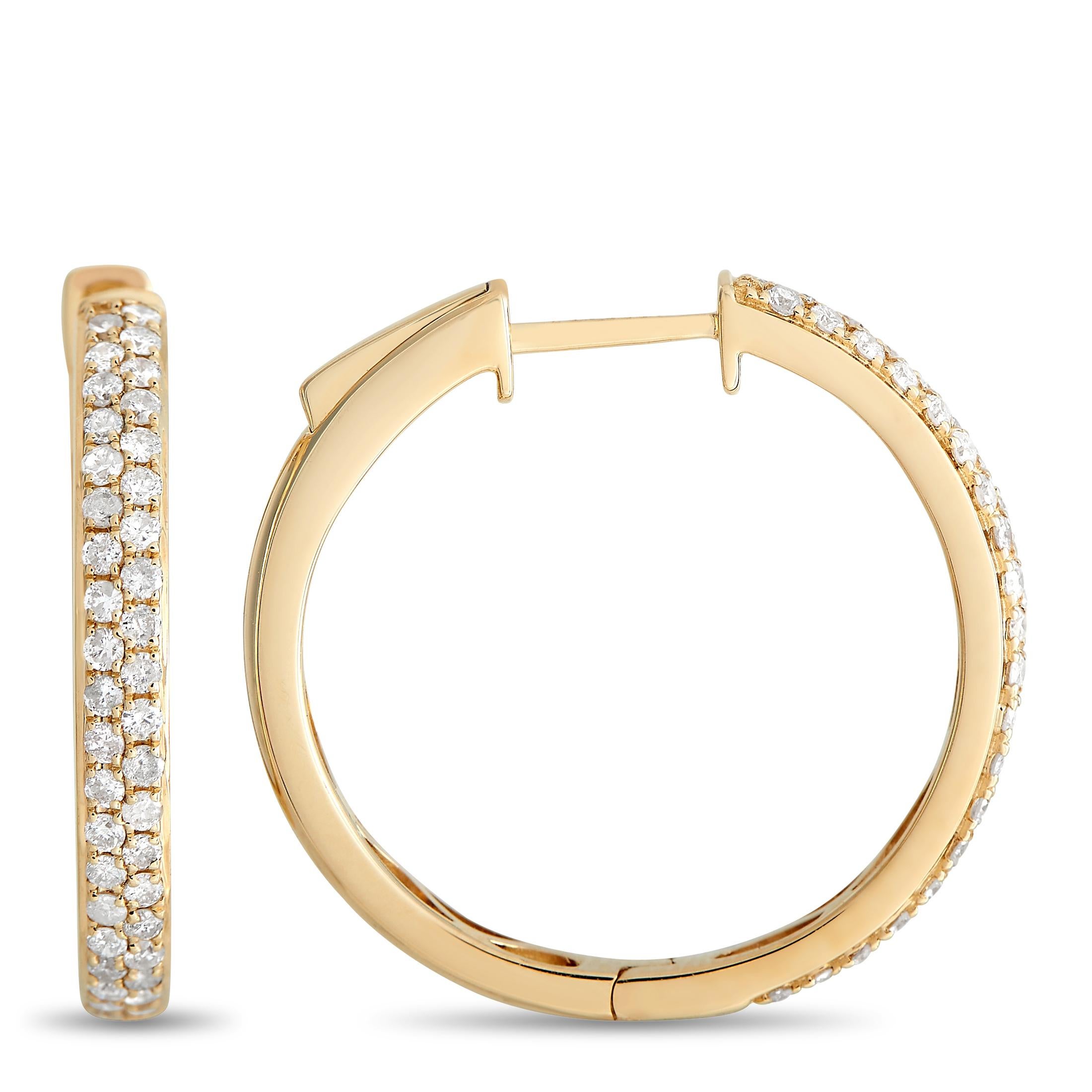 A lustrous 14K Yellow Gold setting measuring 0.75” round serves as the perfect foundation for these elevated hoop earrings. Accented by sparkling diamonds totaling 0.65 carats, they’ll instantly add a touch of luxury to any ensemble. 

This jewelry
