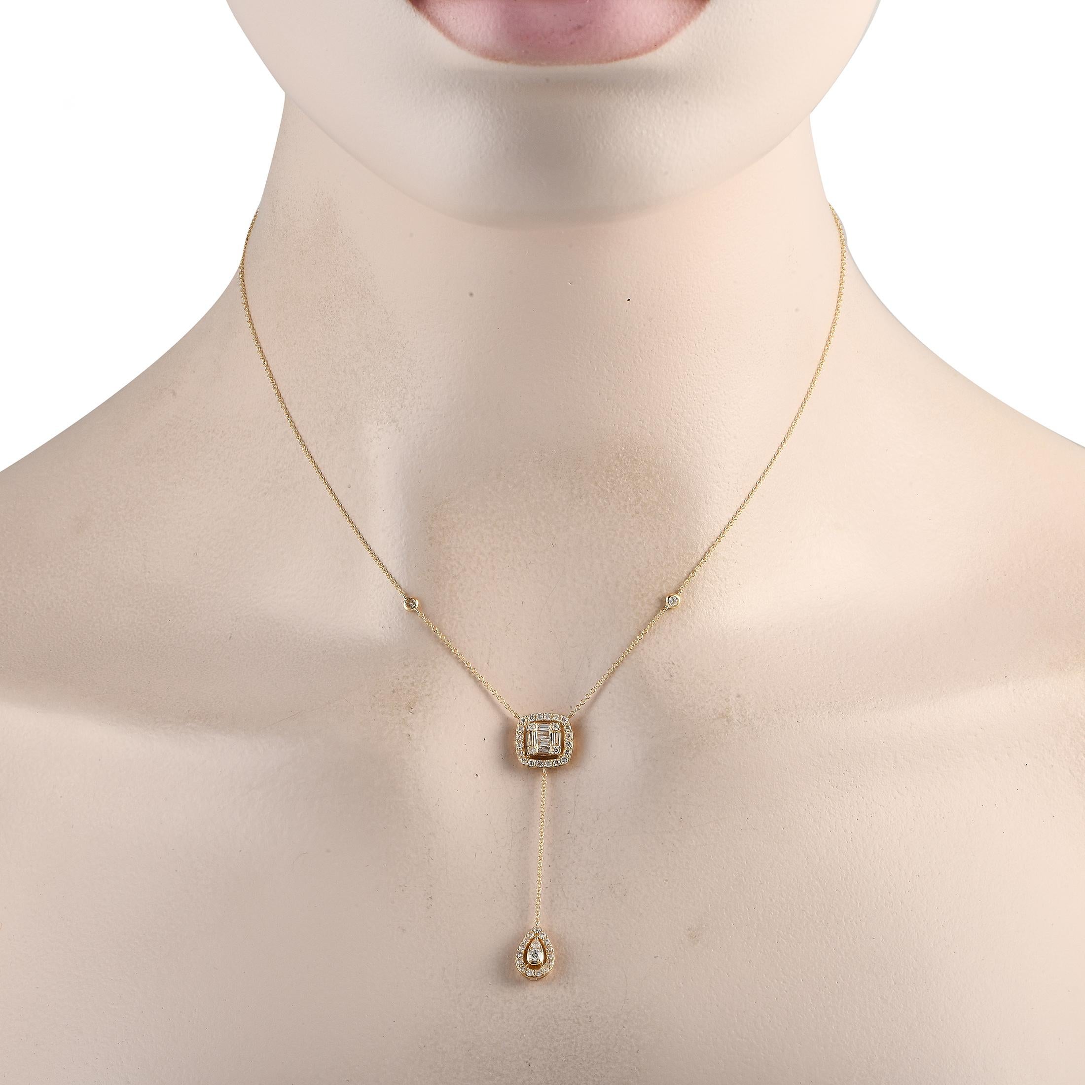 This sophisticated necklace will continually make a statement. Ideal for any occasion, its crafted from 14K Yellow Gold and features a 2 dangling pendant at the center of a 15 chain. Diamonds with a total weight of 075 carats provide the perfect