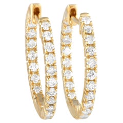 LB Exclusive - Boucles d'oreilles en or jaune 14 carats avec diamant de 0,81 ct.