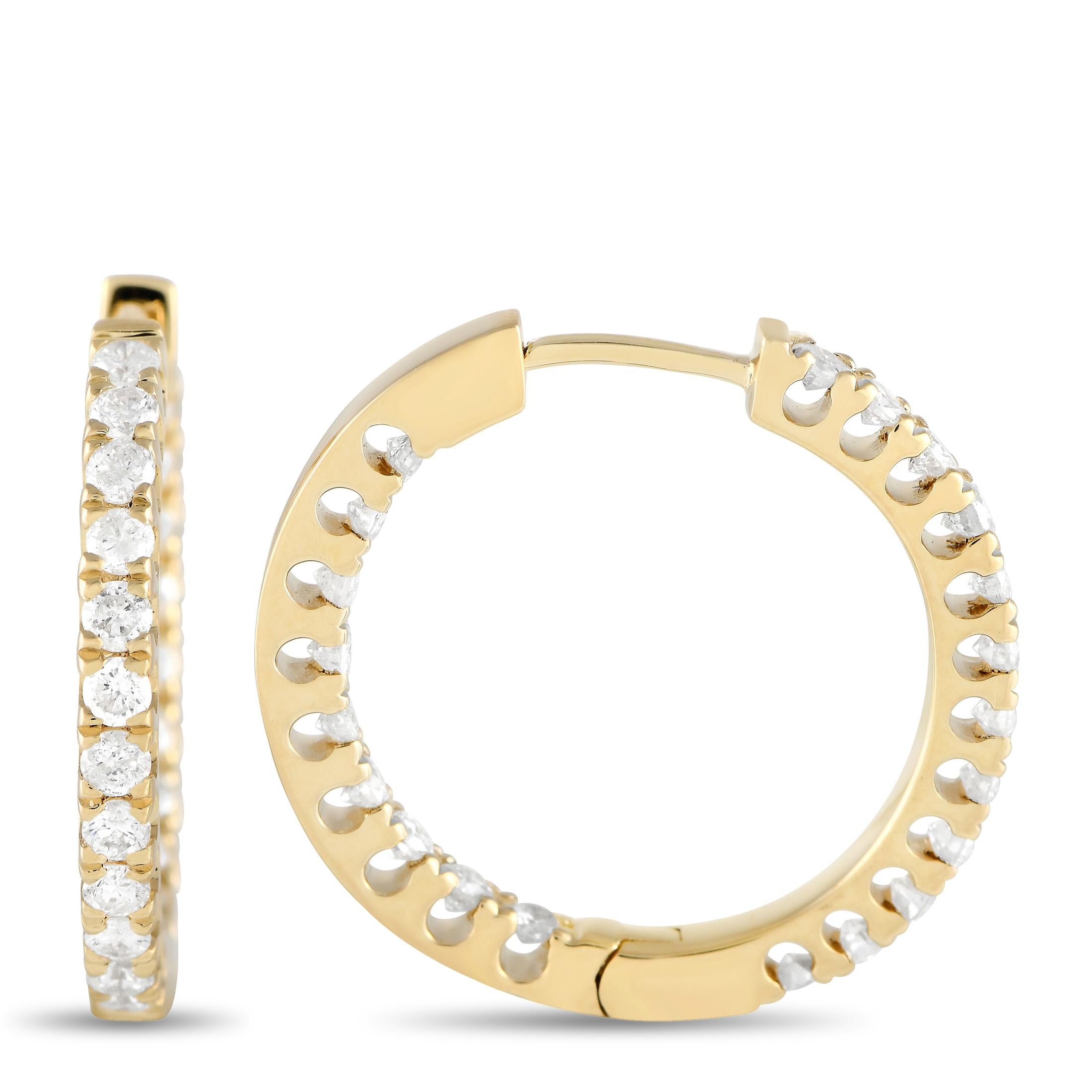 These impeccably crafted hoop earrings will sparkle and shine from any angle. Diamonds totaling 1.0 carats shine brightly from their place within the opulent 14K Yellow Gold setting, which measures 0.75” round.  

This jewelry piece is offered in