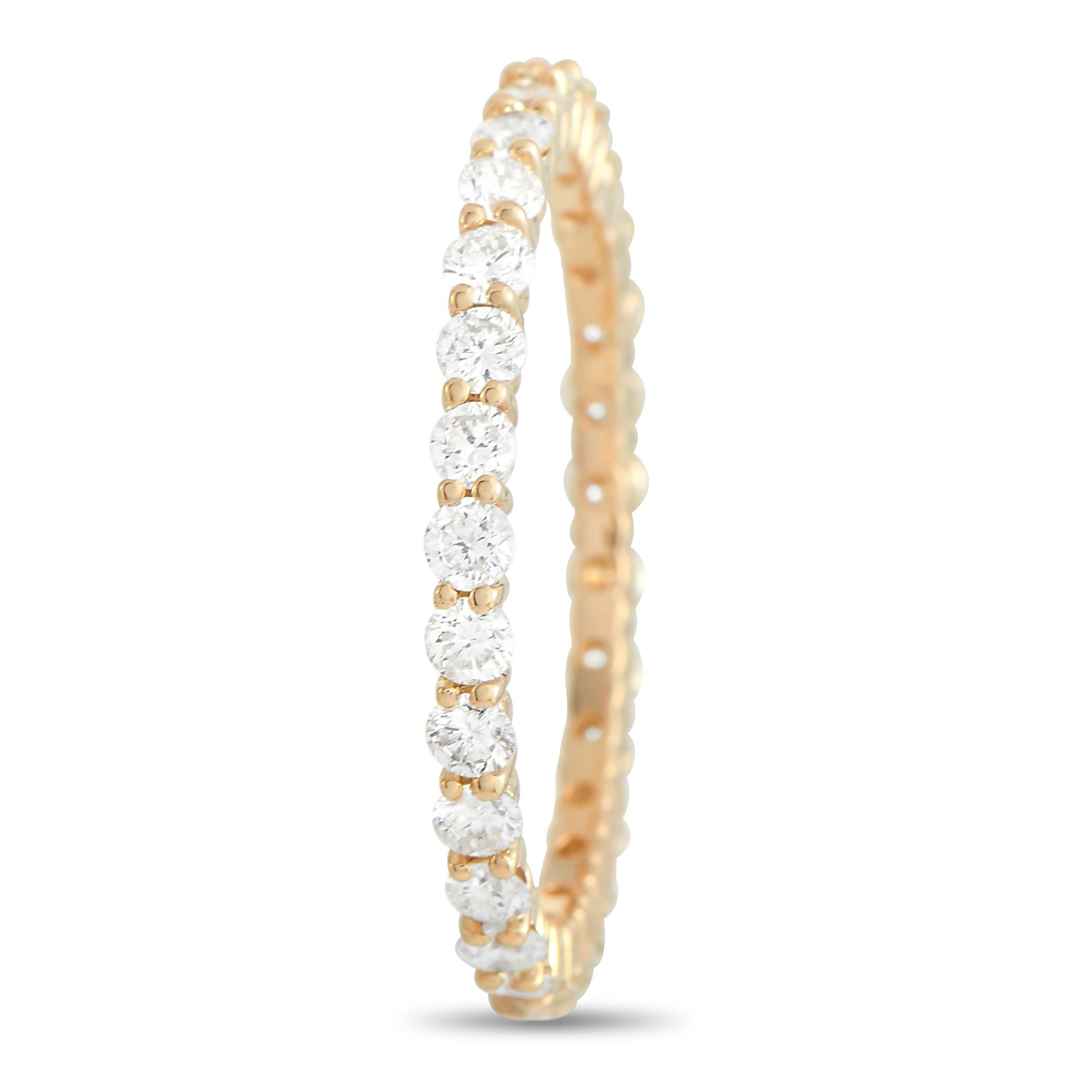 This stunning LB Exclusive 14K Yellow Gold 1.00 ct Diamond Infinity Ring is made with 14K yellow gold and has a single row of round-cut diamonds totaling 1.00 carats encircling the band, each held in place by four small prongs. The ring has a band