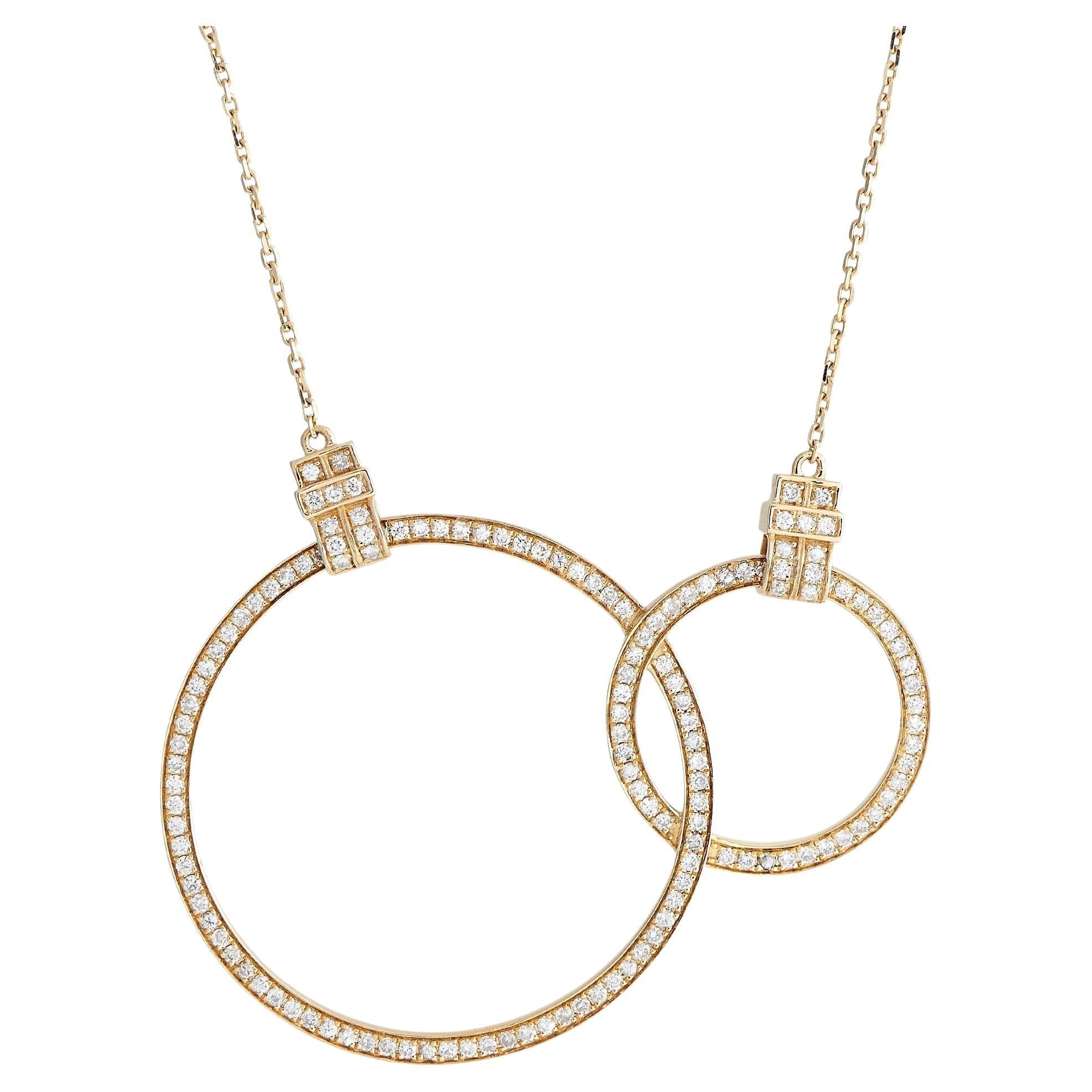 Sold at Auction: 14k YG WG Diamond Louis Vuitton Pendant Necklace
