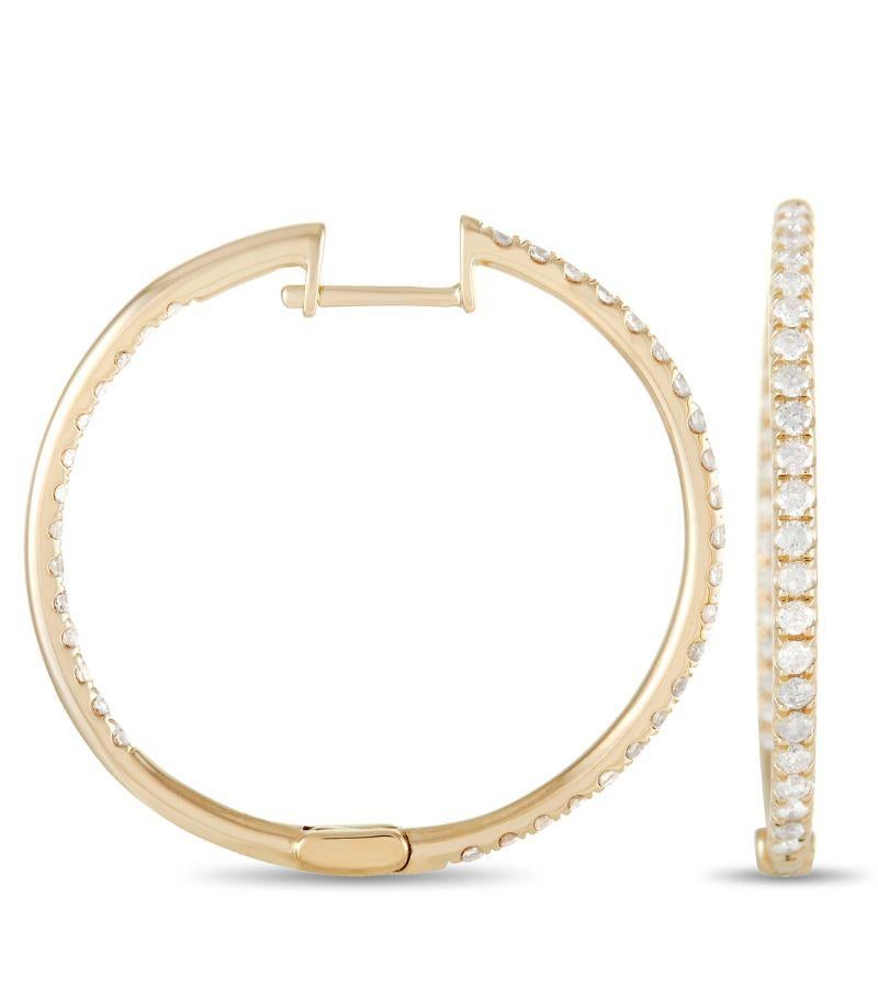 Take any outfit to the next level with these elegant hoop earrings. Made from 14K yellow gold, each one features a series of round cut diamonds that together total 1.00 carats. These earrings measure 1” round - the perfect size to make a subtle