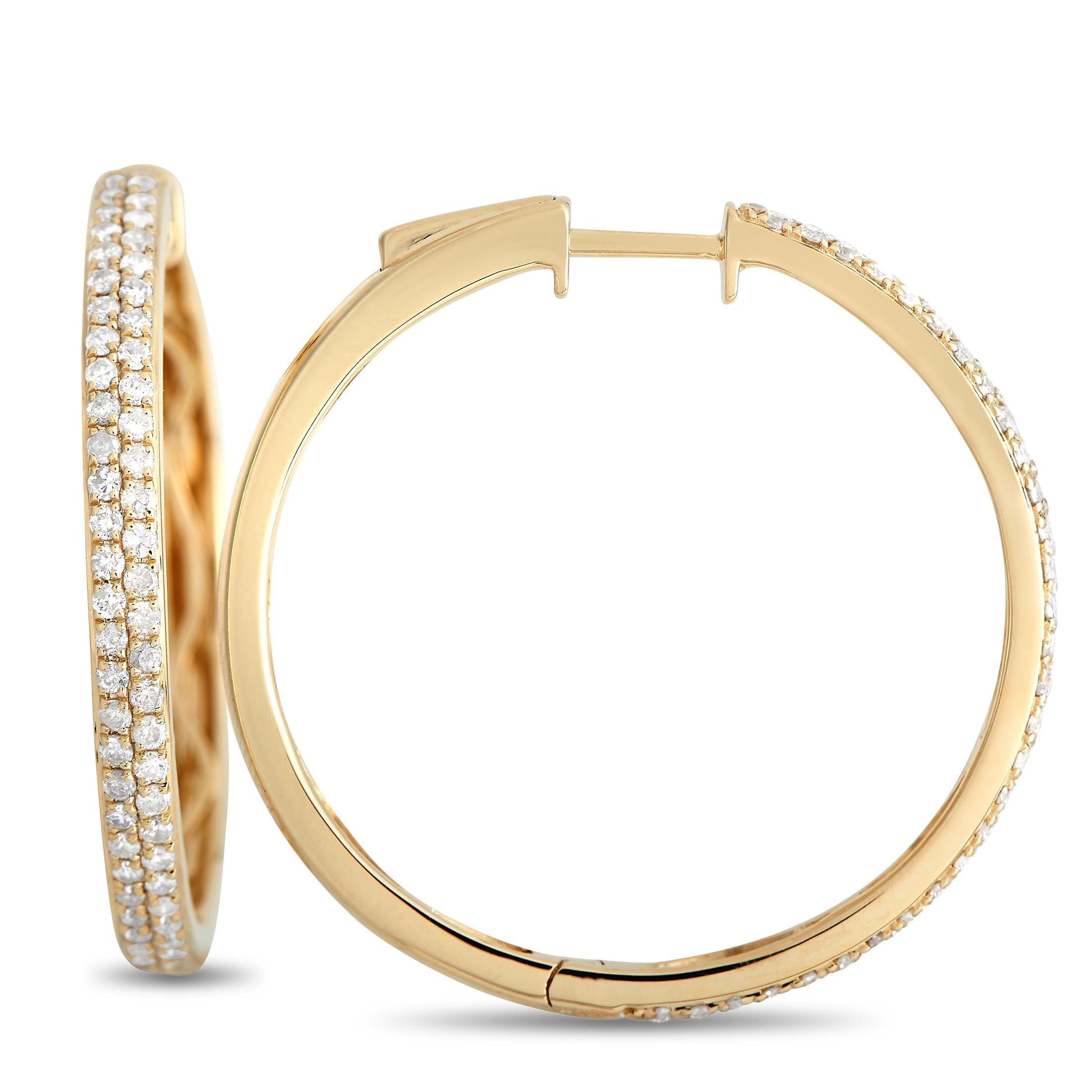 Diamonds with a total weight of 1.0 carats allow these hoop earrings to sparkle and shine along with every move you make. Classic and elegant, each one features a detailed 14K Yellow Gold setting that measures 1.15” round. 
 
This jewelry piece is