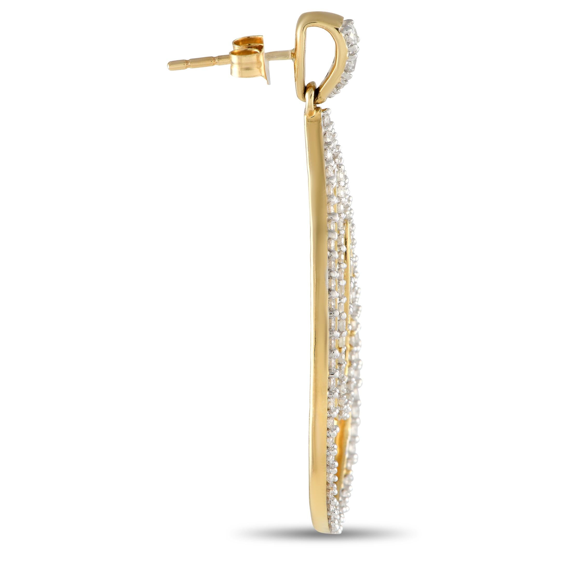 These earrings will instantly take any outfit up a notch. Crafted in 14K yellow gold, each earring measures 1.25 by 0.75 and features two teardrop-shaped hoops in a concentric pattern. Each pear-shaped outline is traced with sparkling diamonds. A