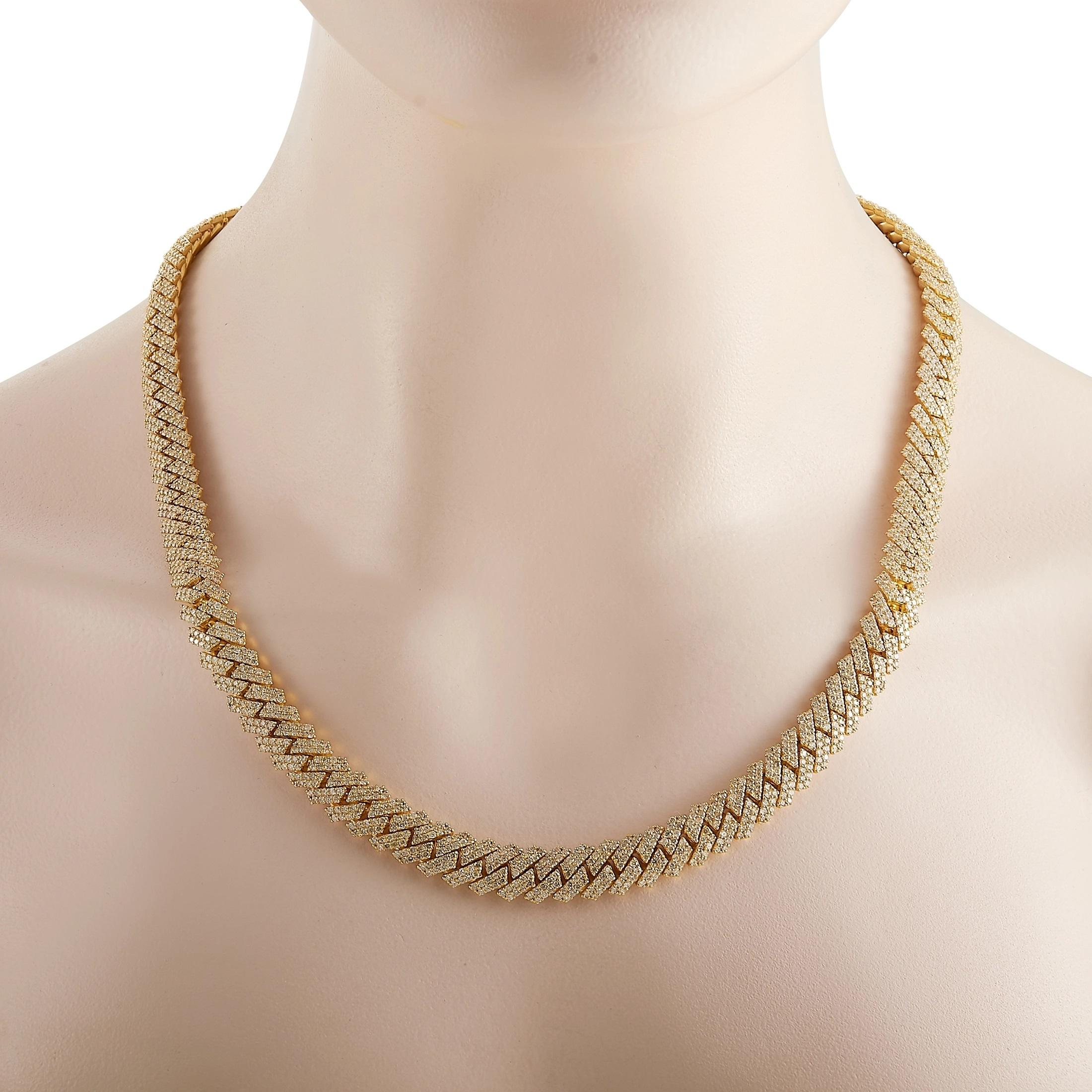 A bold, chain-style design measuring 22” long makes this luxury necklace a true showpiece. The only thing more stylish than the minimalist 14K Yellow Gold setting is the stunning array of diamonds, which together total 23.85 carats. A