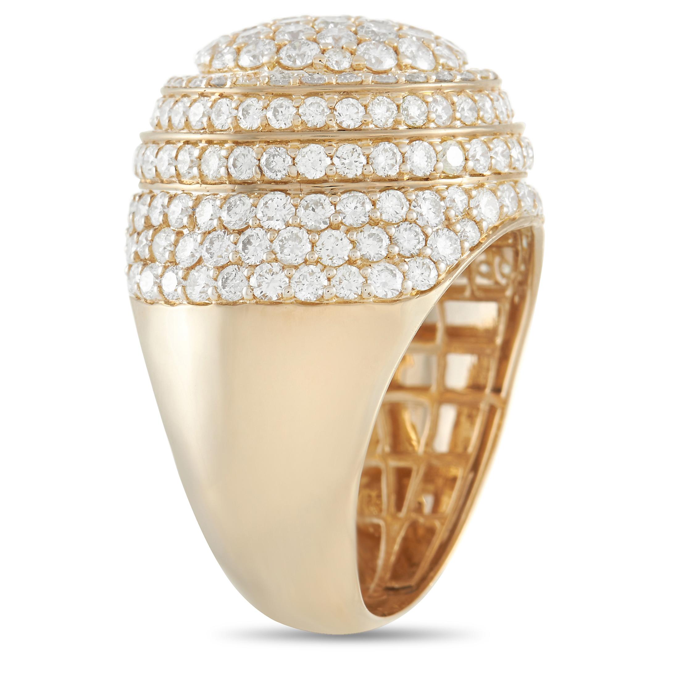 Add luxury to any jewelry collection with this impeccably designed men’s ring. Rows of diamonds totaling 6.40 carats set a circular arrangement make this exceptional ring come alive when it catches the light. Crafted from 14K Yellow Gold, this bold