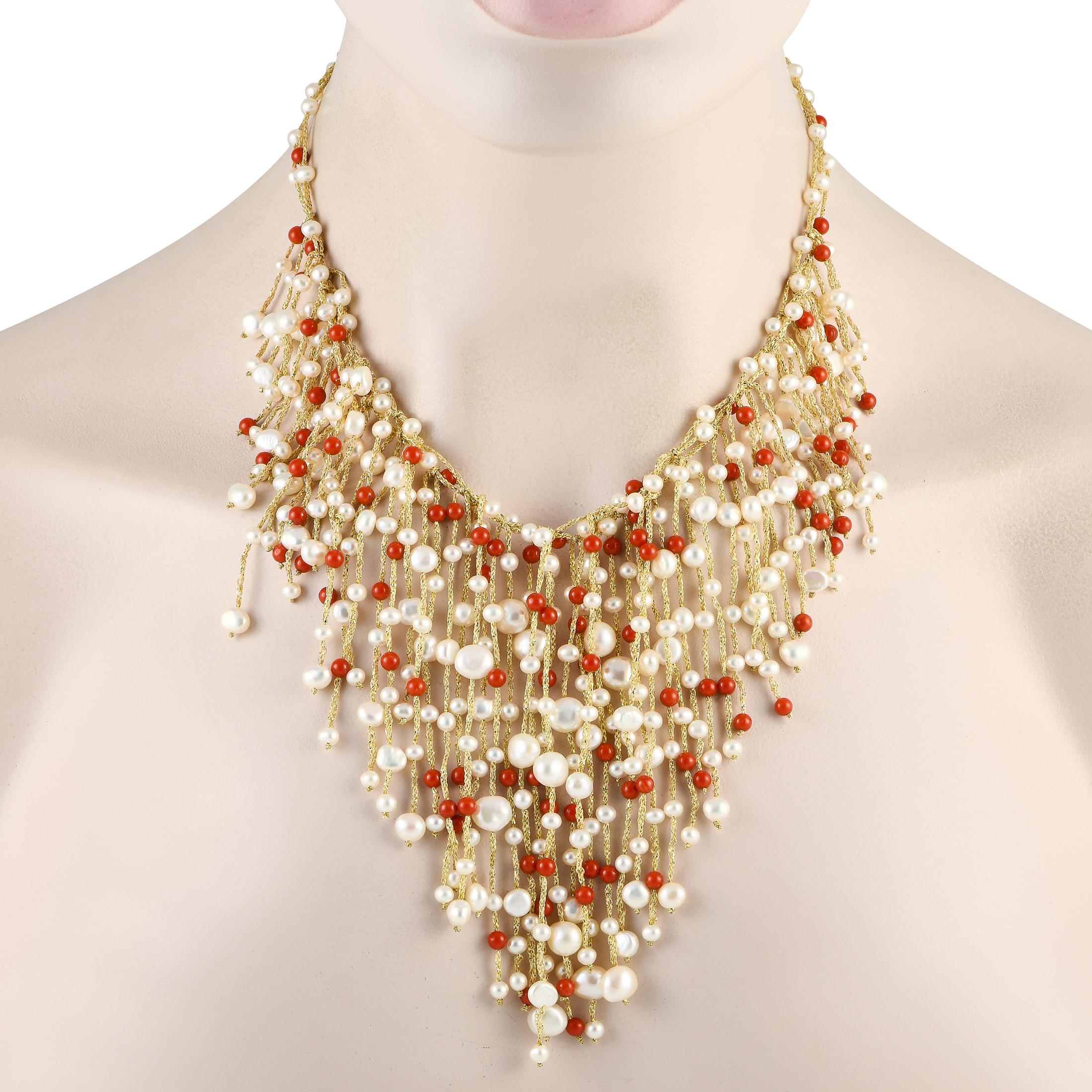 Looking for a way to add color and texture to your style? Adorn your dcolletage with this mood-uplifting fringe necklace. This piece features a 14K yellow gold necklace with a fishhook clasp. Suspending and cascading from the main necklace are
