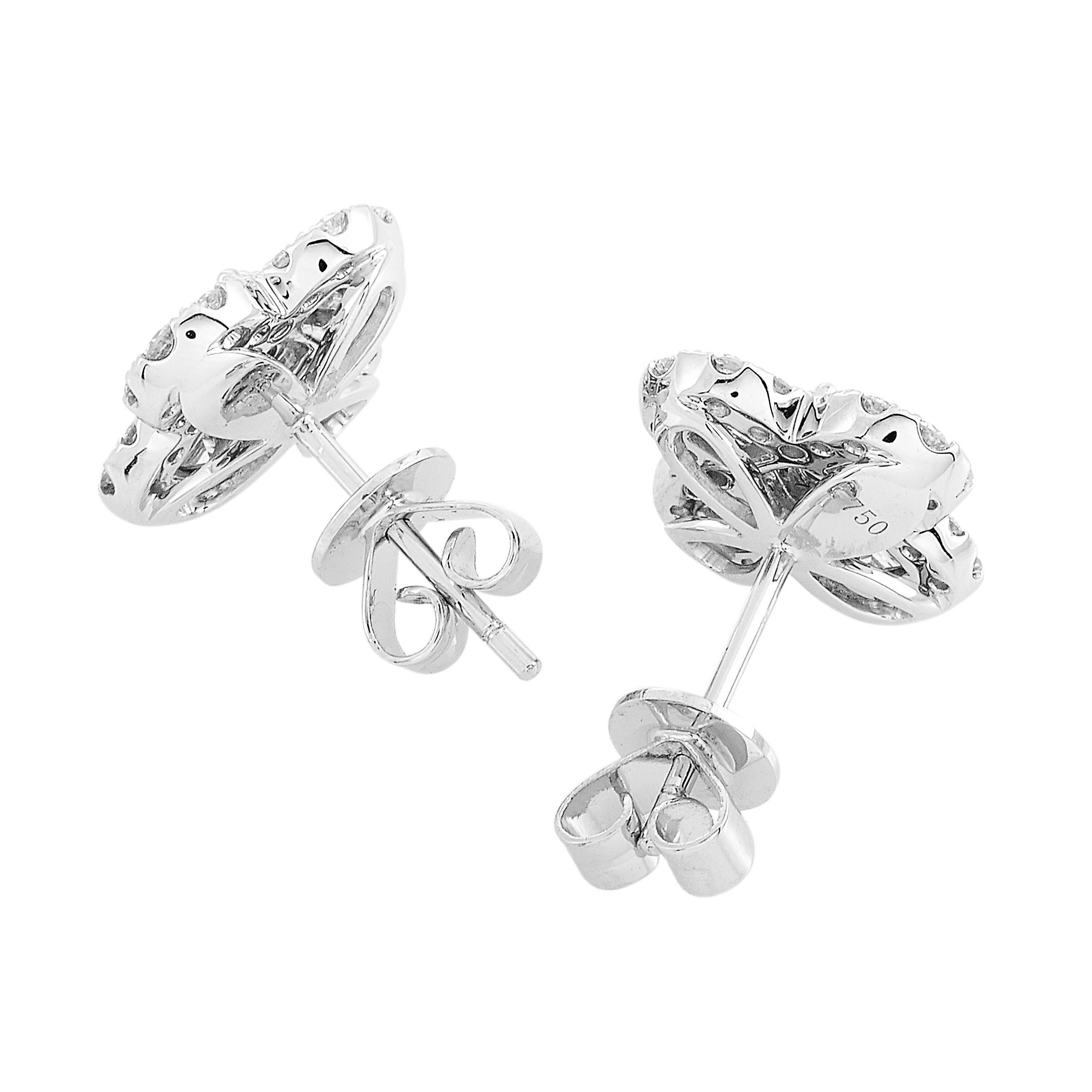 These LB Exclusive earrings are made of 18K white gold and each weighs 2.3 grams, measuring 0.55” in length and 0.55” in width. The earrings are embellished with round and asscher diamonds that total 0.58 and 0.96 carats respectively.

The pair is