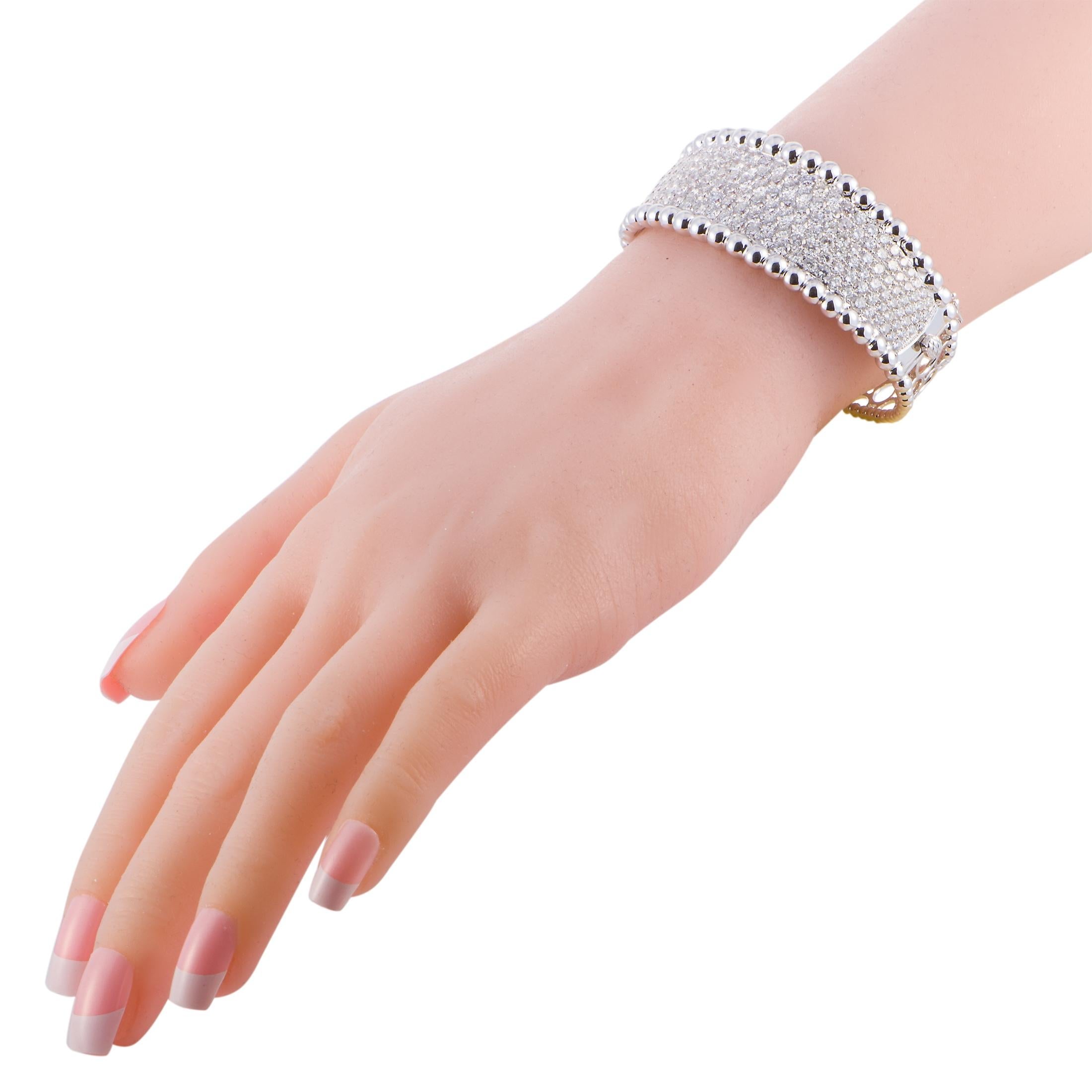 This LB Exclusive bracelet is made out of 18K white gold and diamonds that total 12.51 carats. The bracelet weighs 47.5 grams and measures 7.85” in length, boasting a 2.50” diameter.
 
 Offered in brand new condition, this jewelry piece includes a