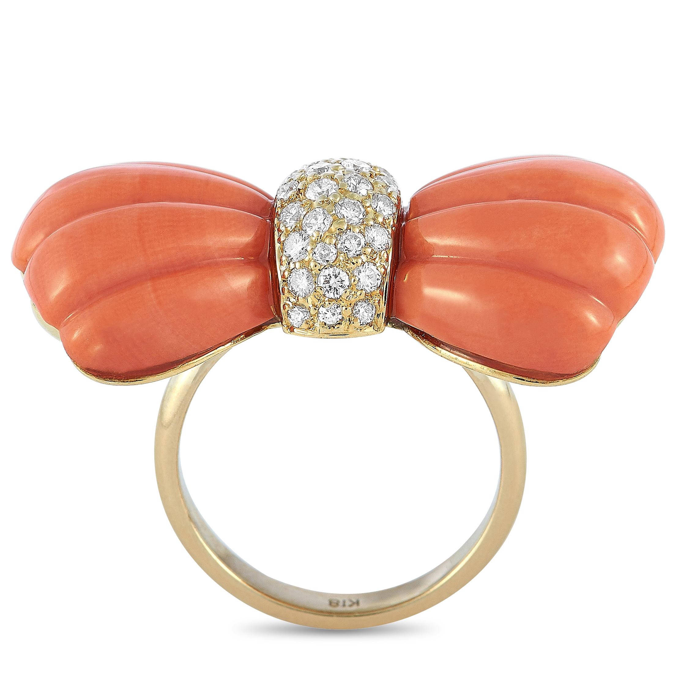 This LB Exclusive ring is made of 18K yellow gold and embellished with corals and a total of 0.65 carats of diamonds. The ring weighs 13.2 grams and boasts band thickness of 3 mm and top height of 7 mm, while top dimensions measure 33 by 18