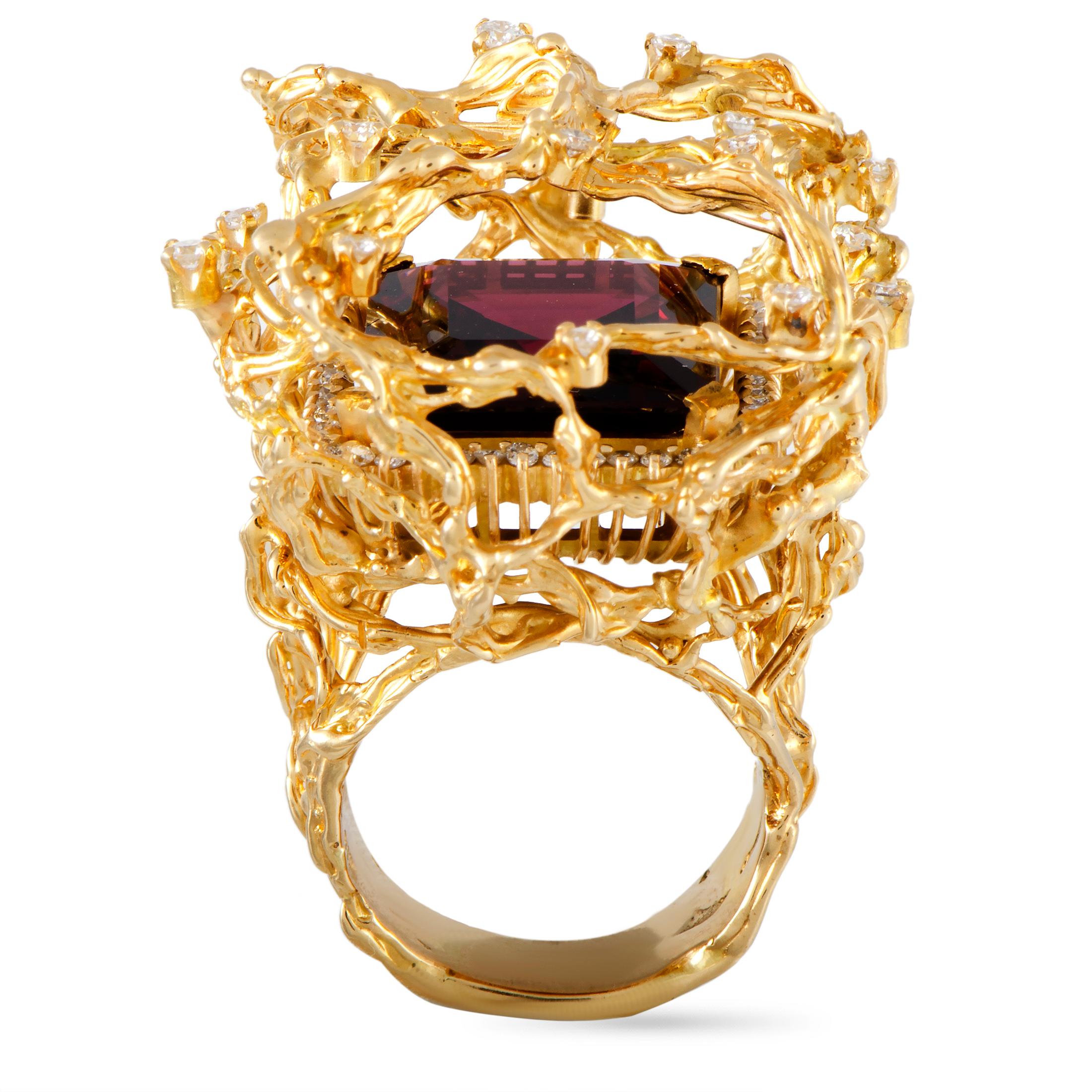 This LB Exclusive ring is crafted from 18K yellow gold and set with a rhodolite that weighs 22.27 carats and a total of 1.25 carats of diamonds. The ring weighs 34.1 grams, boasting band thickness of 8 mm and top height of 23 mm, while top