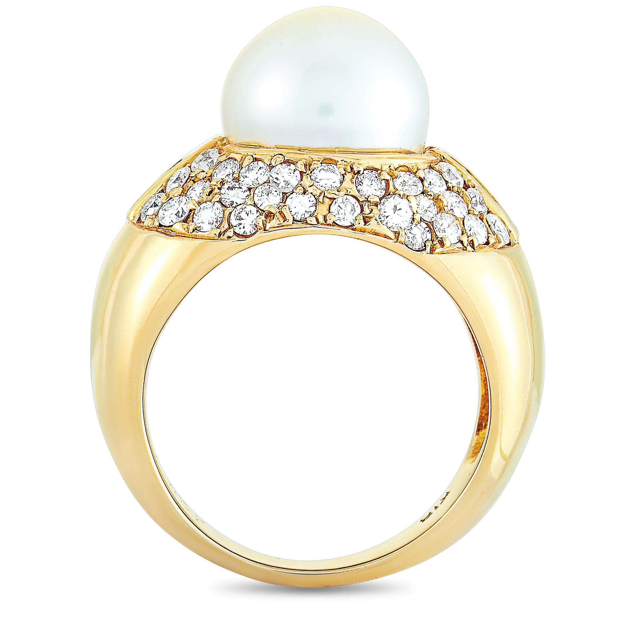 This LB Exclusive ring is crafted from 18K yellow gold and weighs 15.6 grams. It boasts band thickness of 4 mm and top height of 12 mm, while top dimensions measure 21 by 13 mm. The ring is set with an 11.3 mm pearl and a total of 1.51 carats of