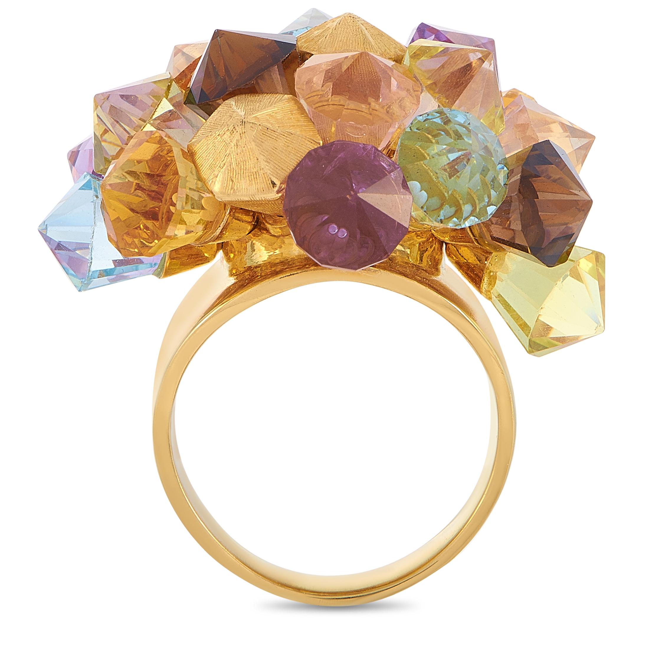 This LB Exclusive ring is made of 18K yellow gold and embellished with citrine, peridot, topaz and amethyst stones. The ring weighs 24.5 grams and boasts band thickness of 4 mm and top height of 15 mm, while top dimensions measure 32 by 35 mm.
Ring